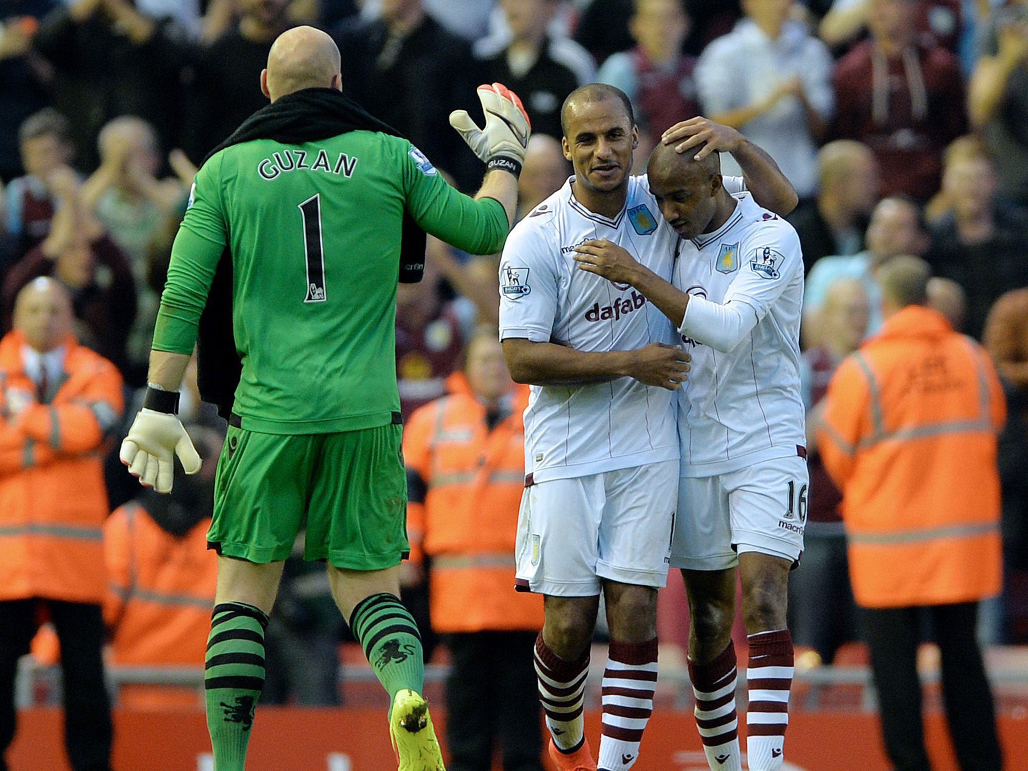 Gabriel Agbonlahor, centre, celebrates with Fabian Delph, right, after scoring the game’s only goal