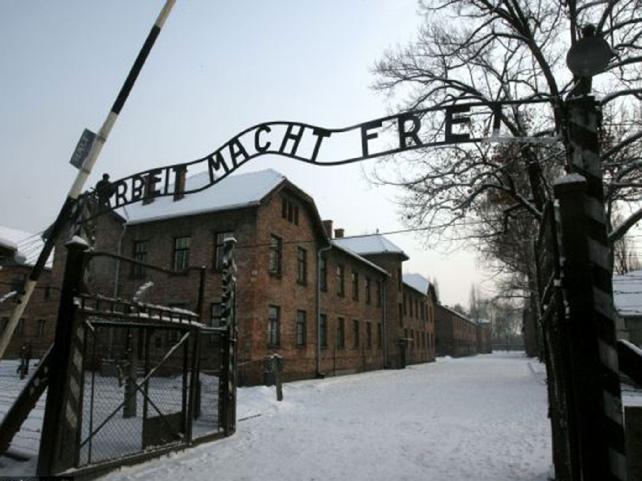 The main gate at Auschwitz. The inscription reads: "Arbeit macht frei" ("Work Makes Free" or "Work Liberates")