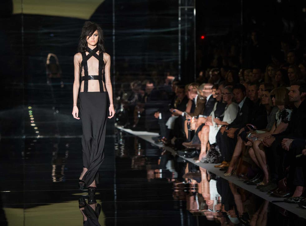 Models walk the runway at the Tom Ford show during London Fashion Week Spring Summer 2015