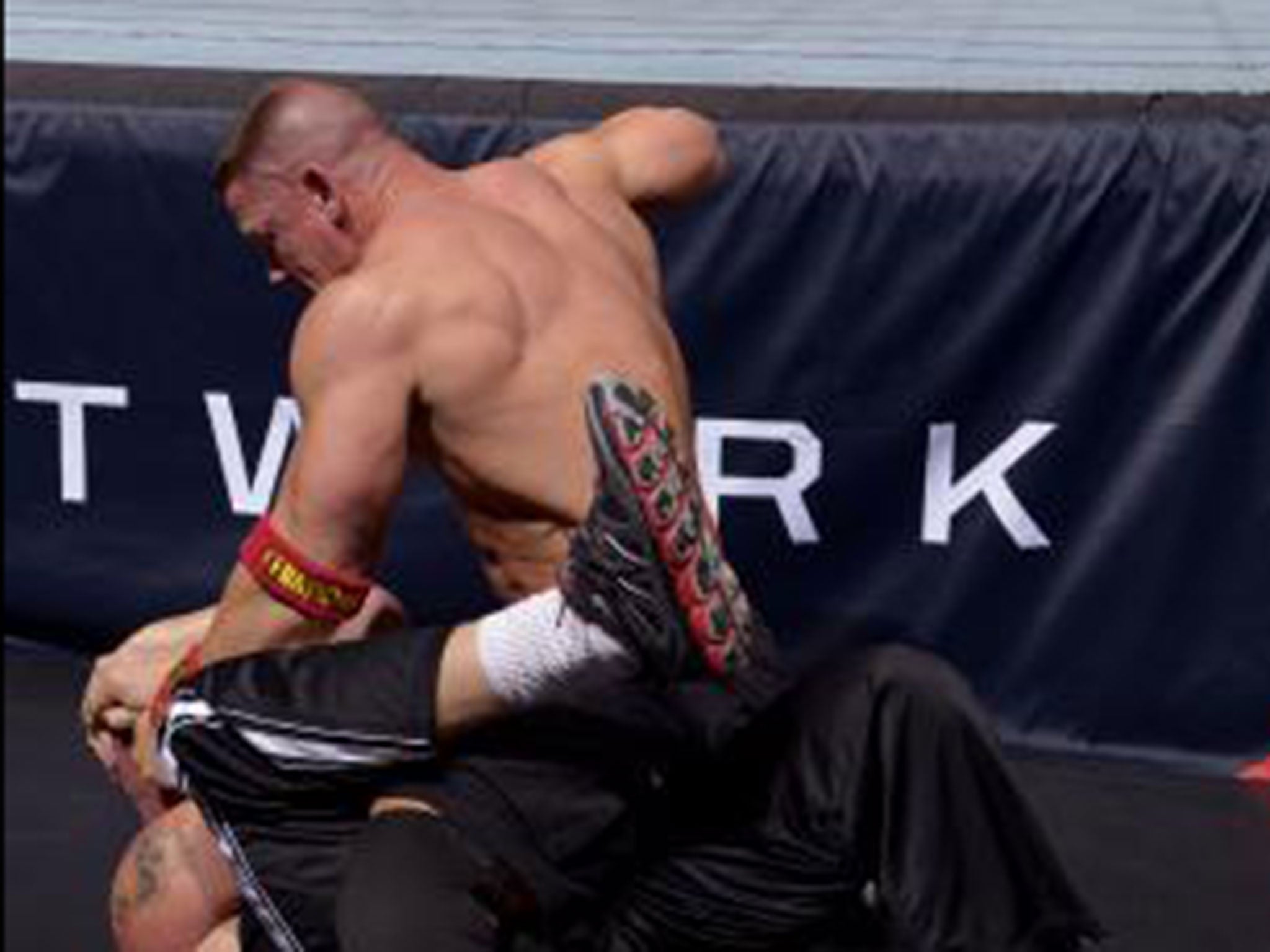 John Cena beats down on Brock Lesnar