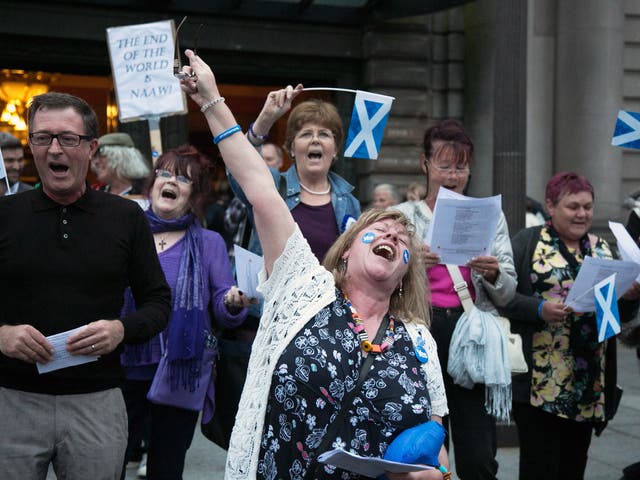 Yes supporters gather outside the Usher Hall, which is hosting a Night for Scotland in Edinburgh 