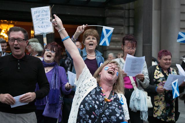 Yes supporters gather outside the Usher Hall, which is hosting a Night for Scotland in Edinburgh 