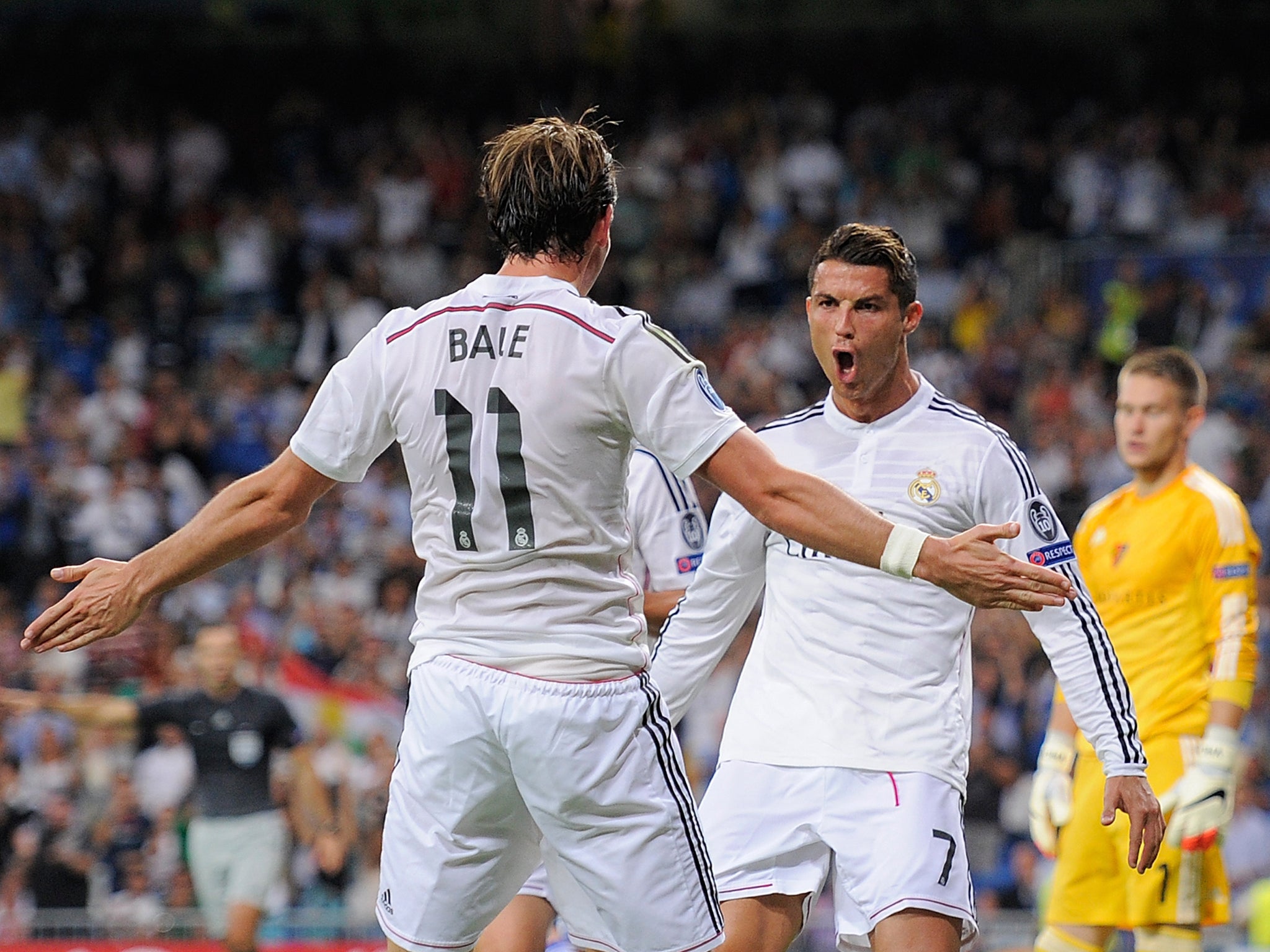 Gareth Bale and Cristiano Ronaldo celebrate during a win for Real Madrid