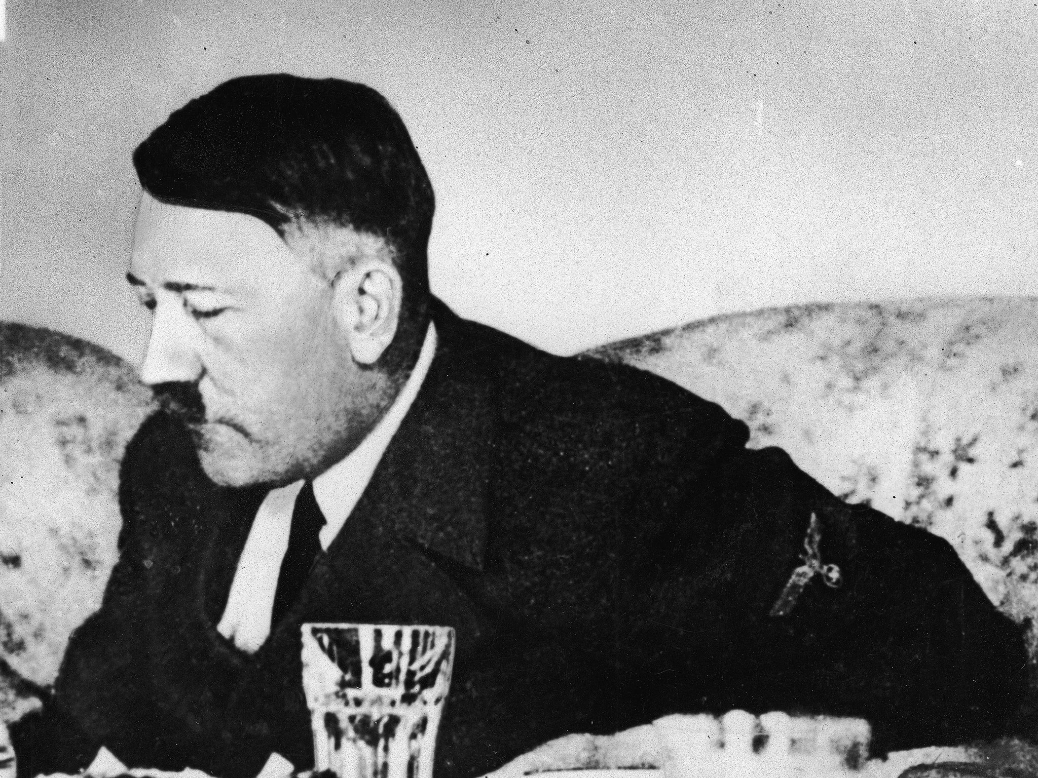 German dictator Adolf Hitler dines in a still from a private home movie