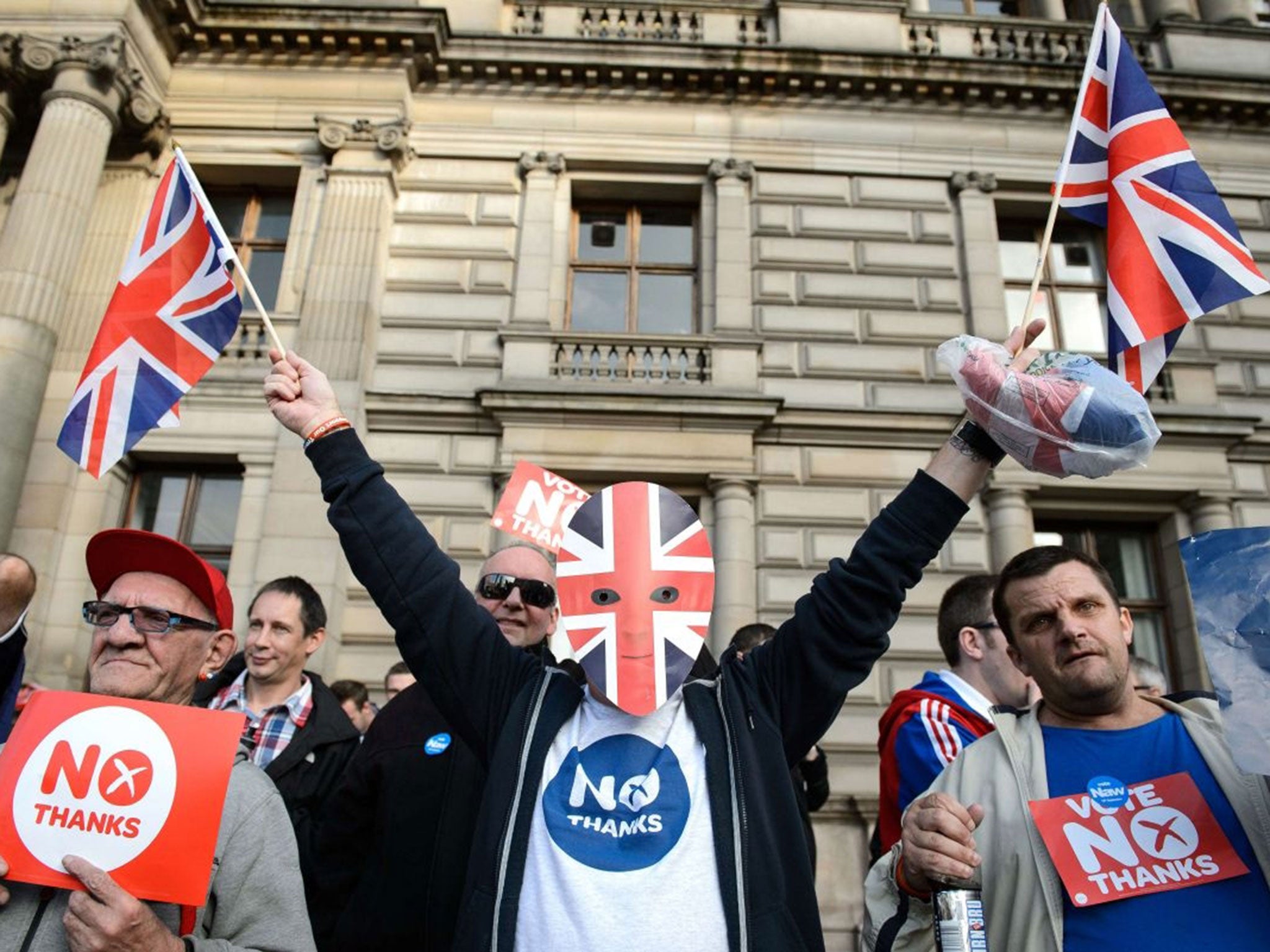 Pro-union activists rally opposite of pro-independence supporters in Glasgow's George Square, in Scotland
