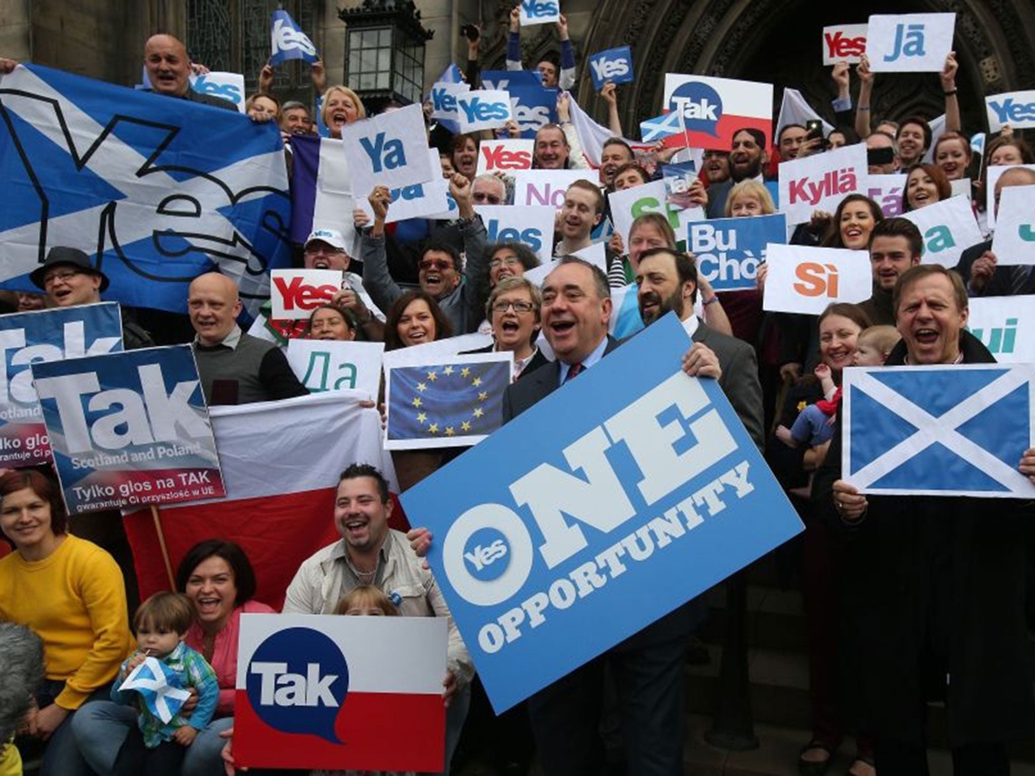 Scottish First Minister Alex Salmond, front center, meets with Scots and other European citizens to celebrate European citizenship and "Scotland's continued EU membership with a Yes vote" at Parliament Square in Edinburgh, Scotland.