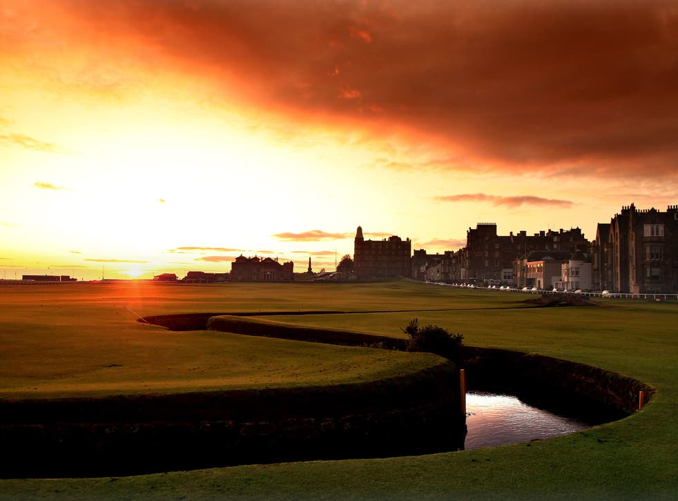The sun rises over St Andrews golf course