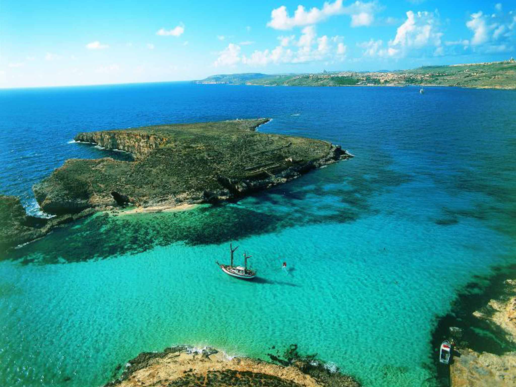 The Blue Lagoon in Malta is a popular spot for tourists
