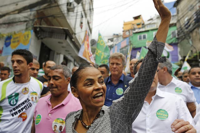 Marina Silva campaigning in the Rocinha slum of Rio de Janeiro. She was thrust into the contest on 13 August when the Socialist Party’s original candidate was killed in an plane crash