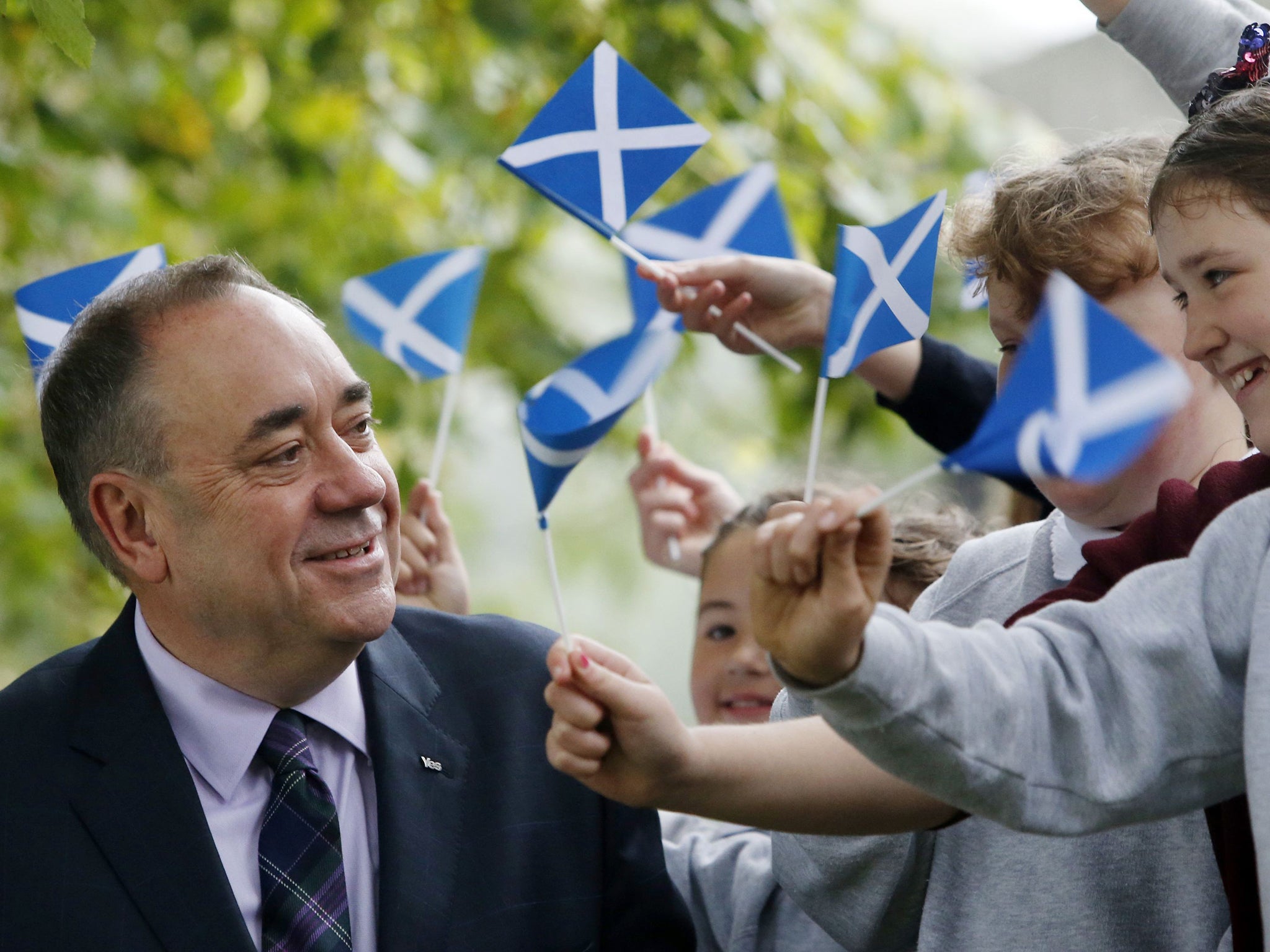 First Minister of Scotland Alex Salmond chats to school children at Strichen Primary School in Strichen