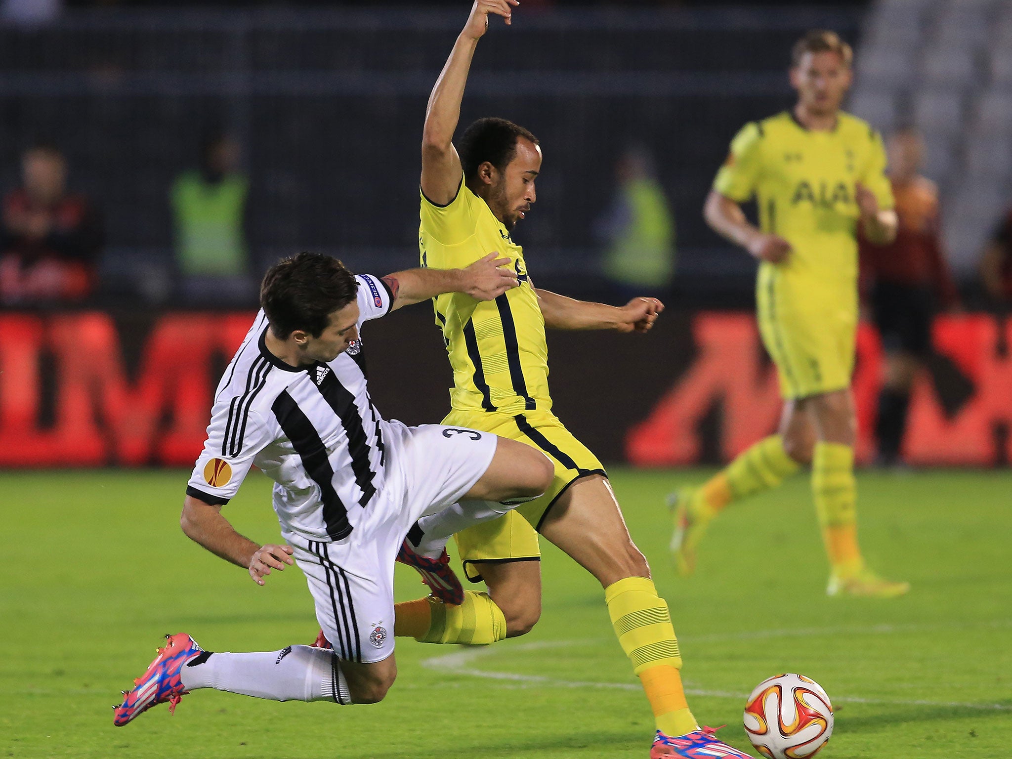 Andros Townsend is challenged by Vladimir Volkov