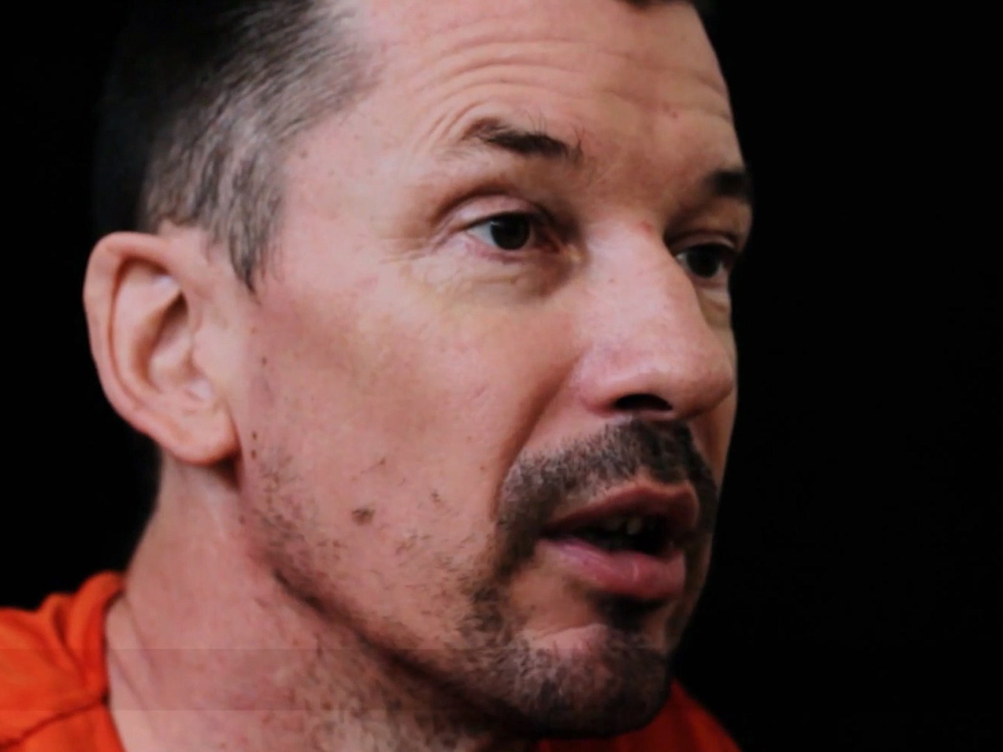 An image grab of journalist John Cantlie taken from a video released by the Islamic State (IS) group through Al-Furqan Media via YouTube