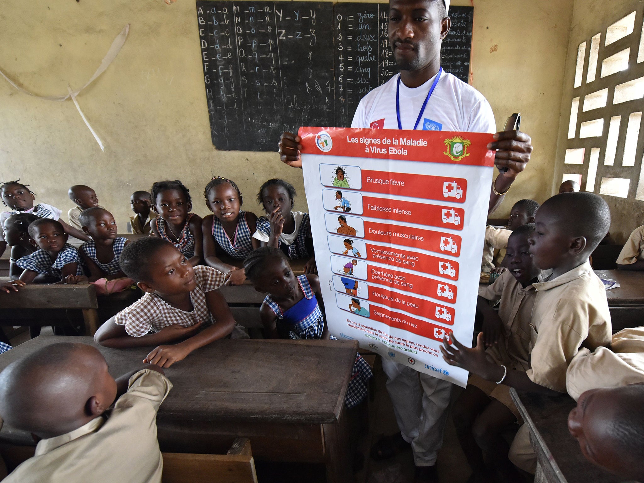 School pupils listen to an ebola prevention programme in Abidjan this week