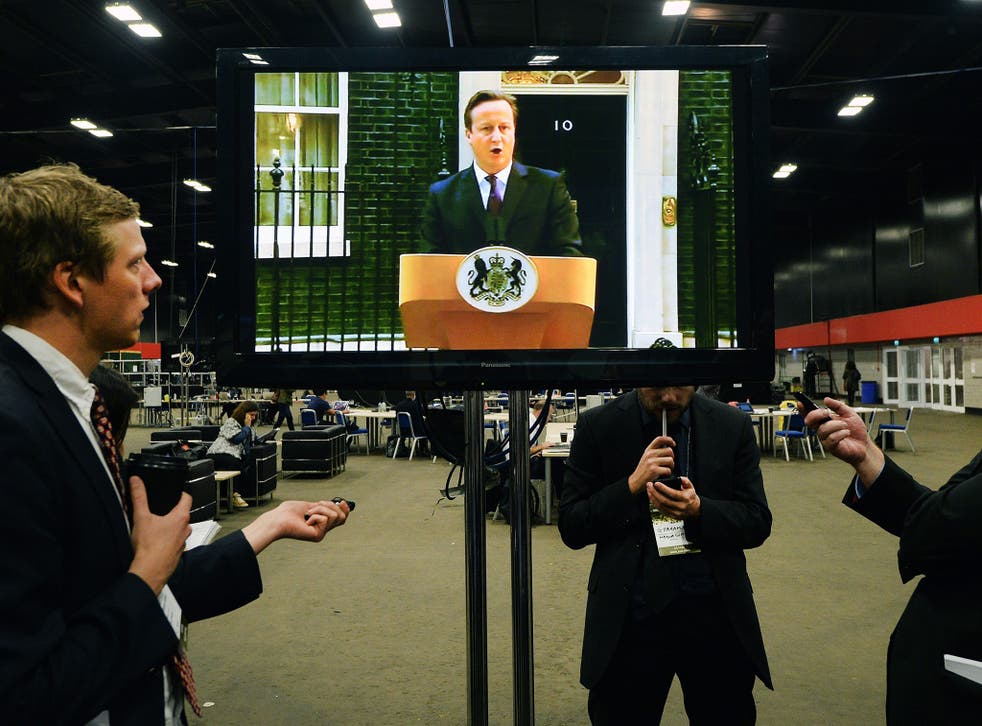 Members of the media listen to British Prime Minister David Cameron’s speech on
the Scottish referendum