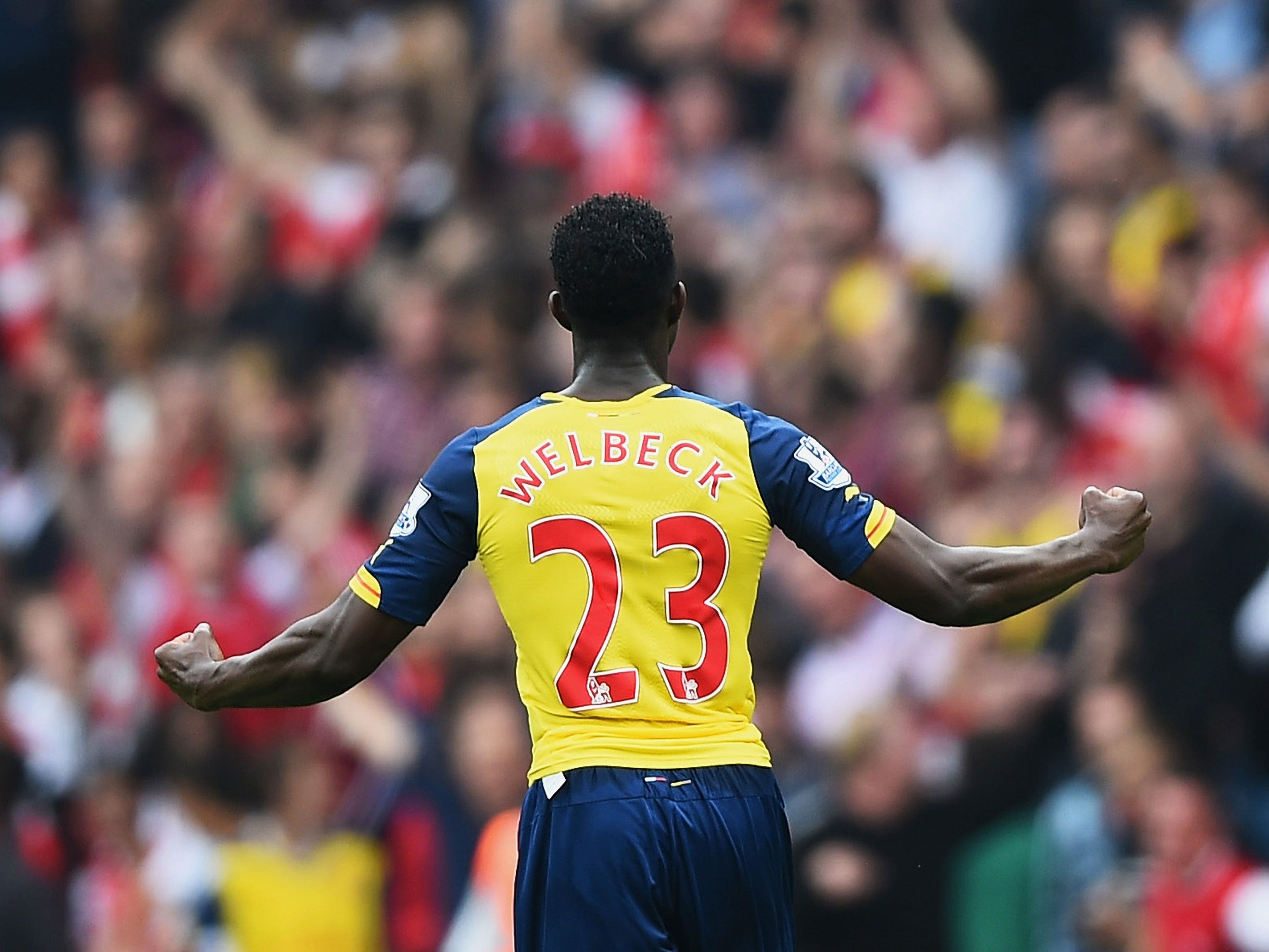 Danny Welbeck celebrates his first goal for Arsenal