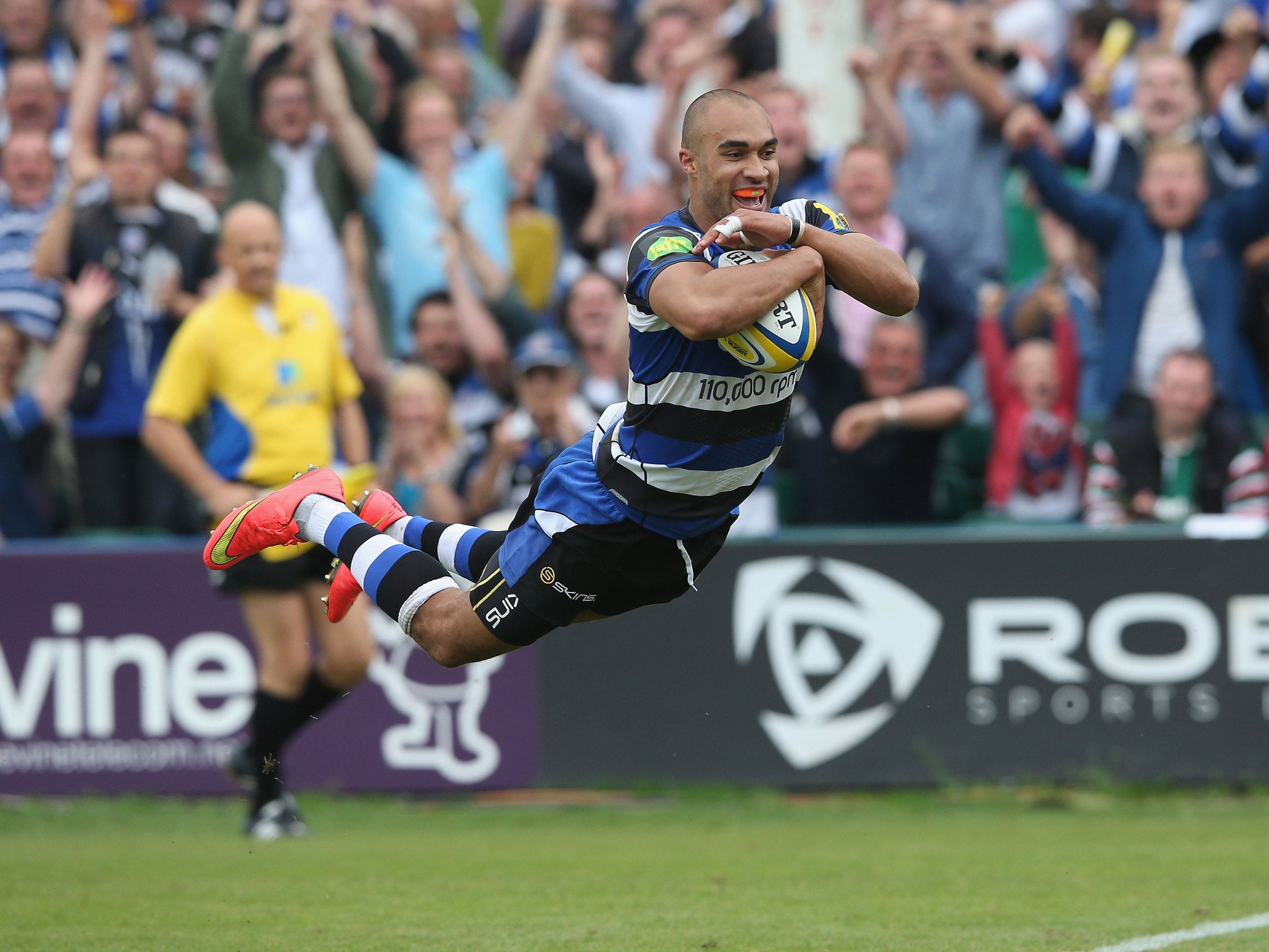 Olly Woodburn dives over for a try 