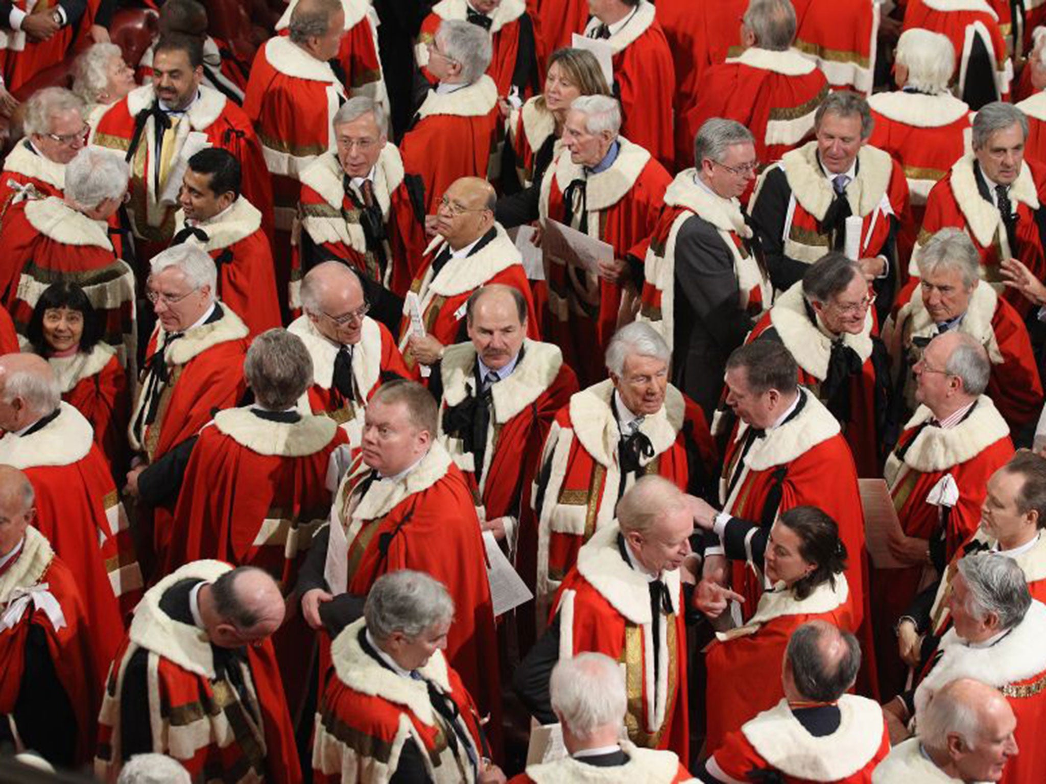 Peers leave the Lords after the state opening of Parliament