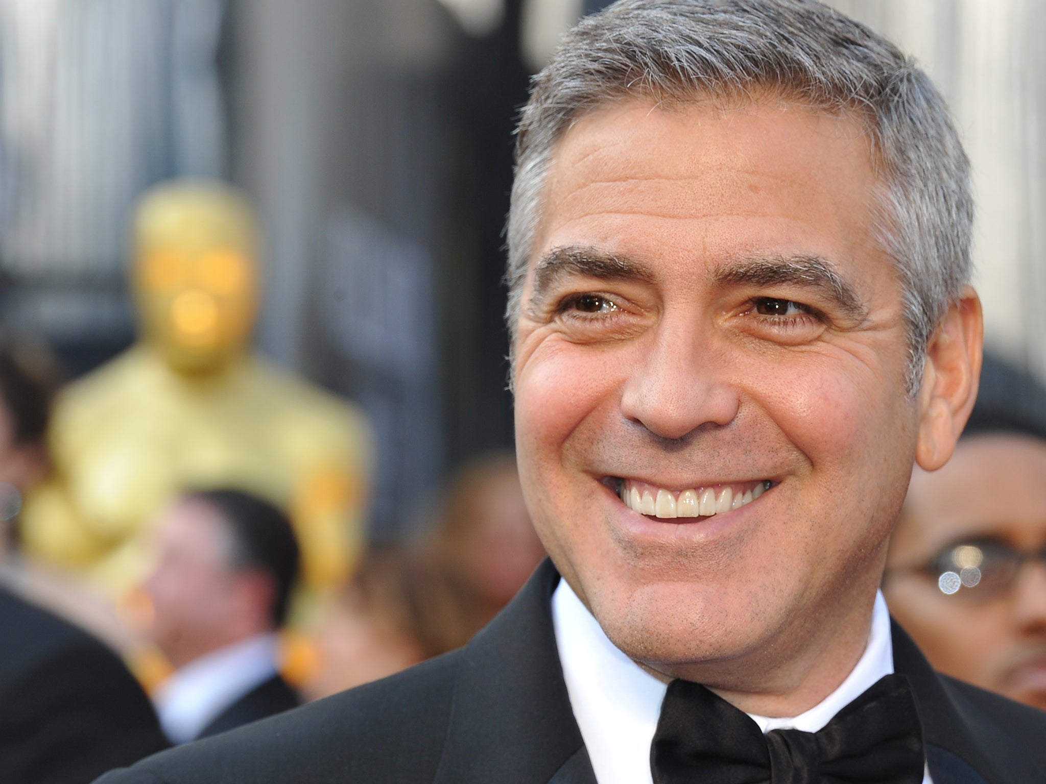 George Clooney is set to go in for a kiss with the Dowager Countess - much to her surprise