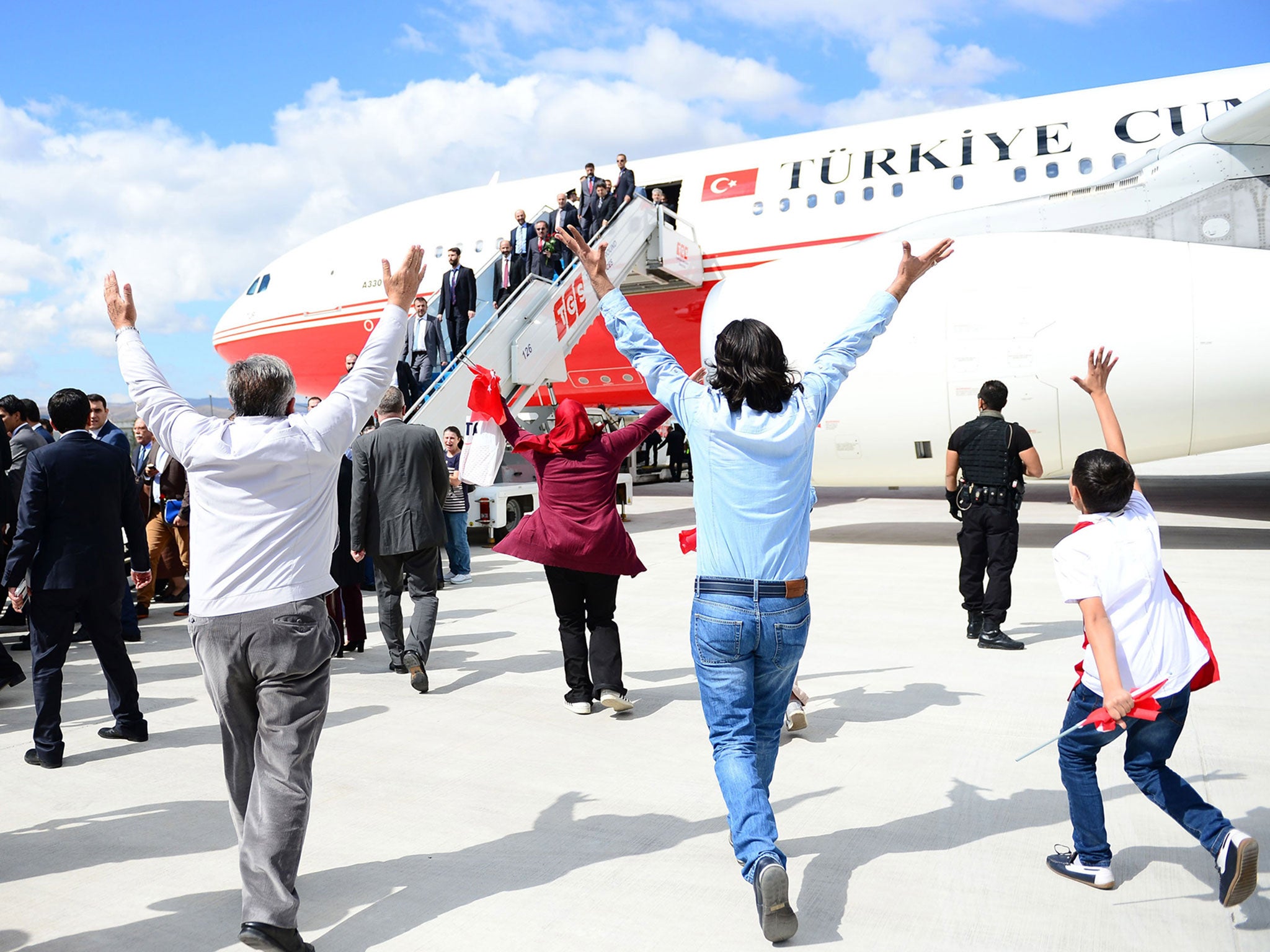 Relatives of the freed hostages greeting their family members in Ankara; questions have been raised about why the brutal organisation chose to release them, unlike other captives