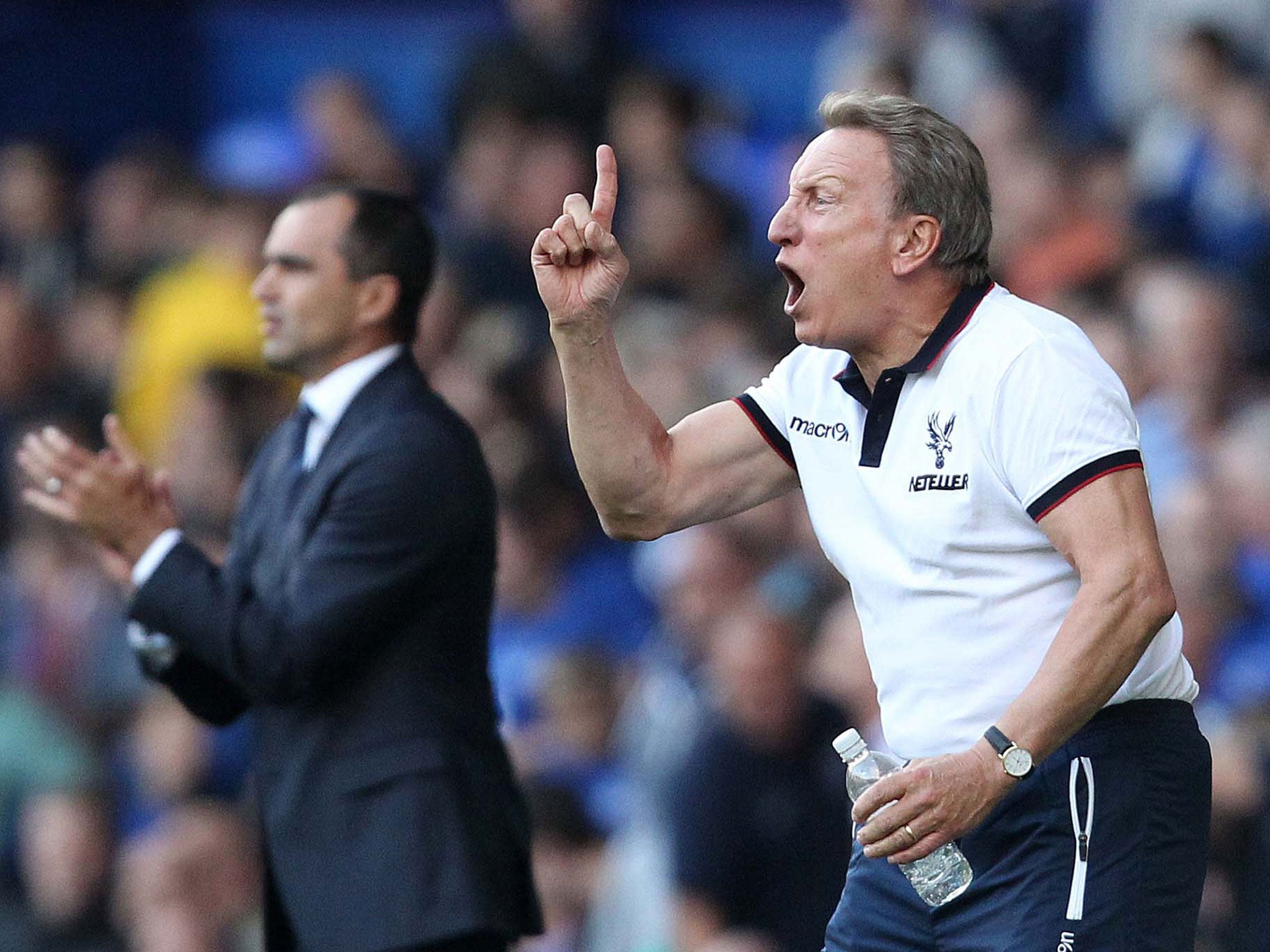 Warnock directs his side during their win over Everton