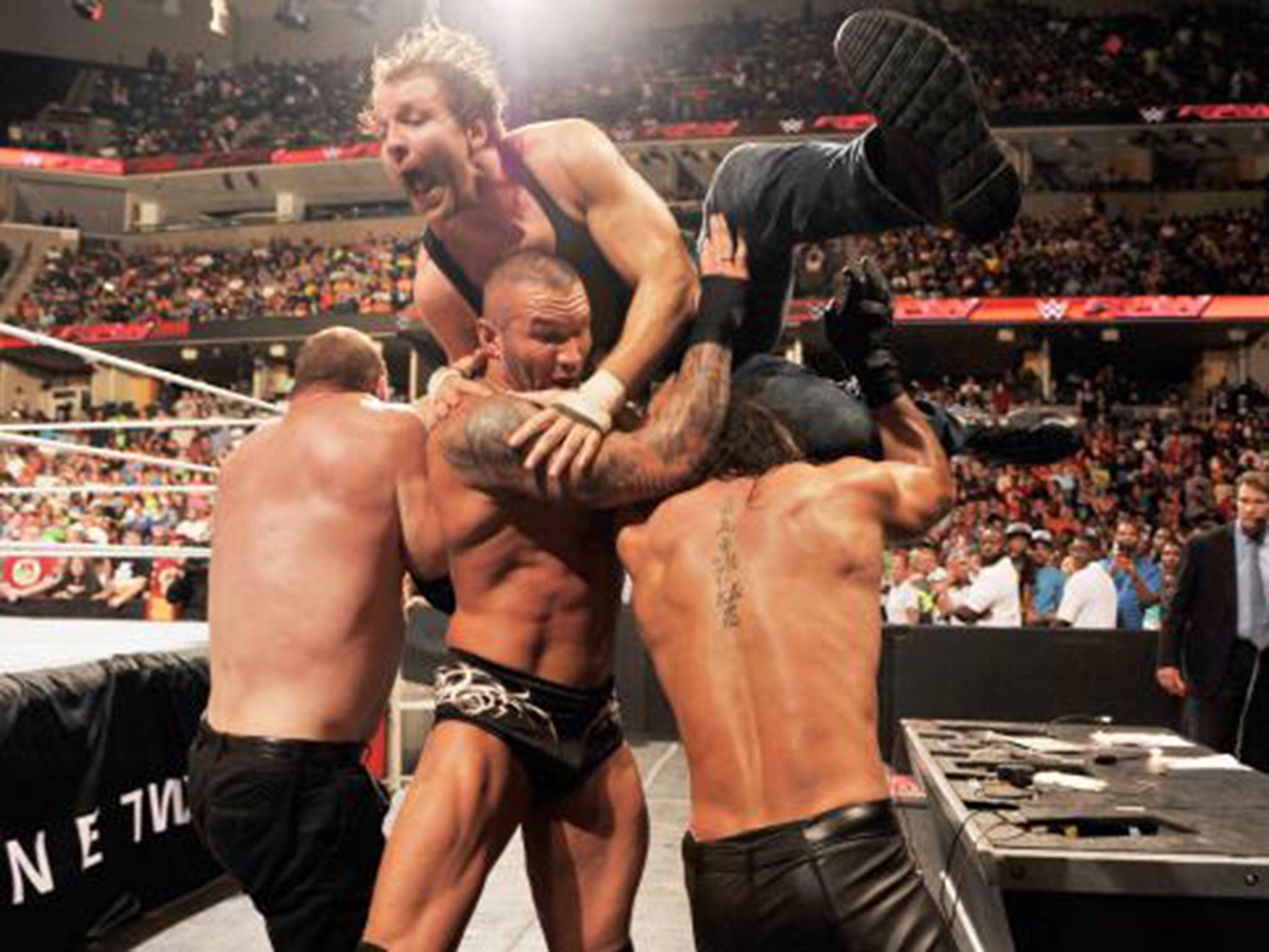 Dean Ambrose launches himself into Kane, Randy Orton and Seth Rollins