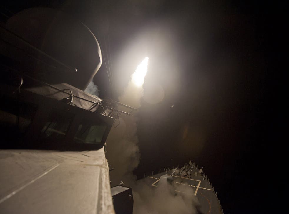 The USS Arleigh Burke (DDG 51) launches a Tomahawk cruise missiles in the Red Sea, to conduct strike missions against Isis group targets in Syria