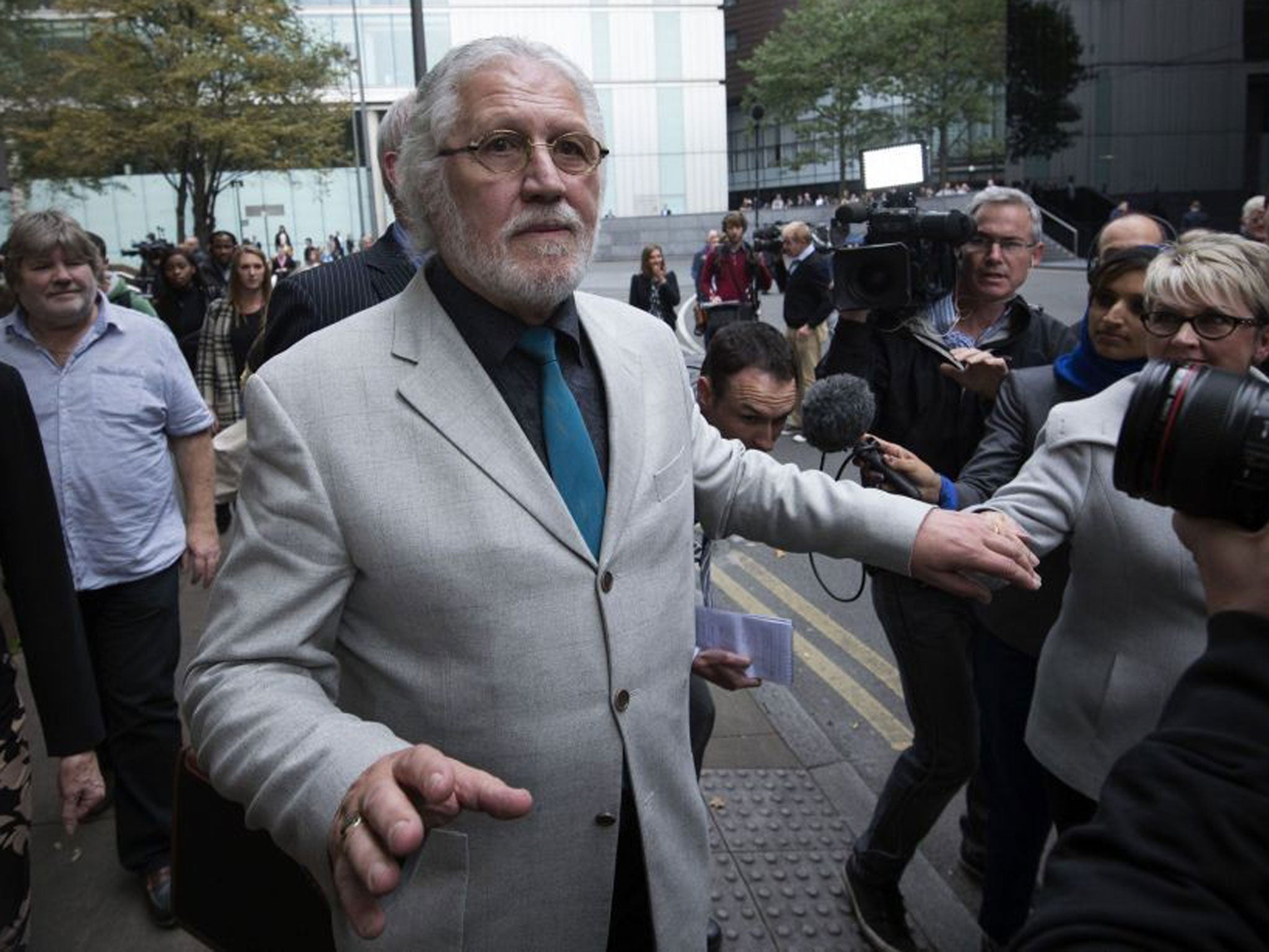 Dave Lee Travis leaves Southwark Crown Court after being found guilty of indecent assault
