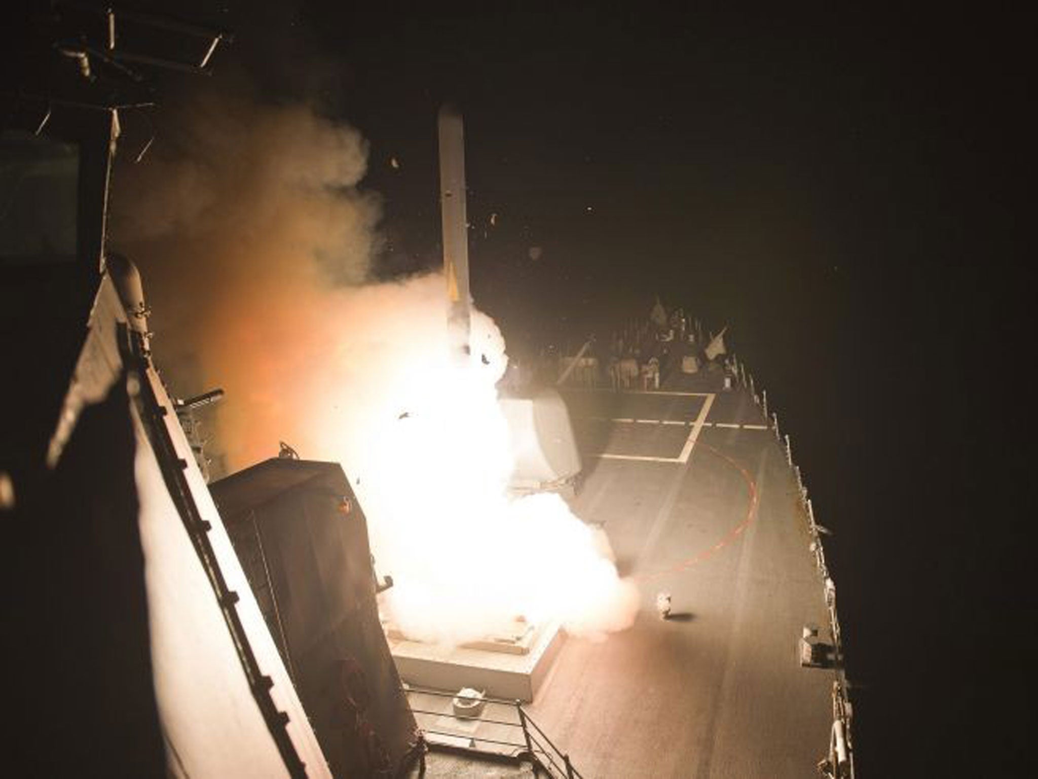 'USS Arleigh Burke' launches a missile from the Red Sea