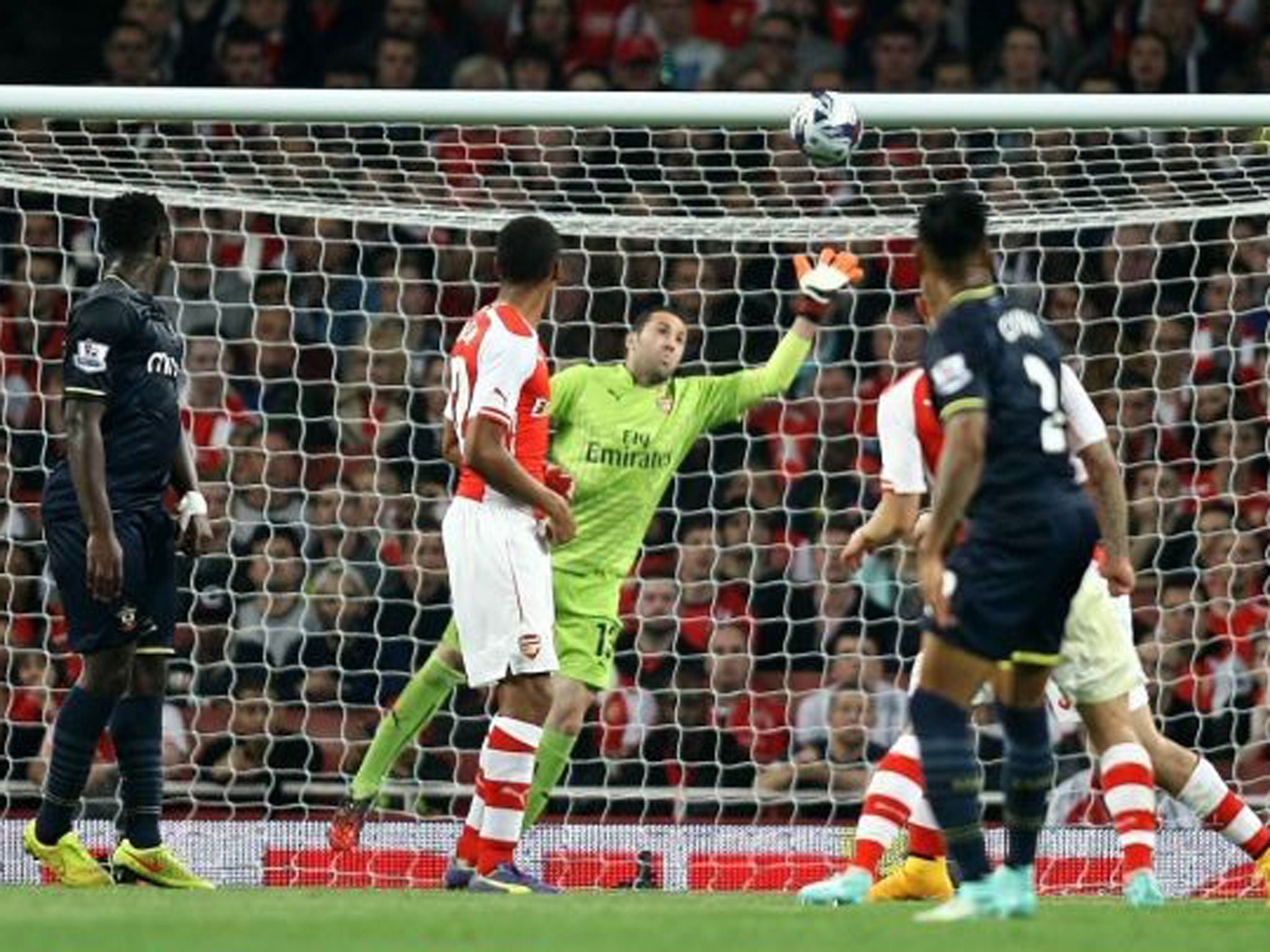 Nathaniel Clyne (No 2) drives home his side's second goal past Arsenal’s David Ospina at the Emirates