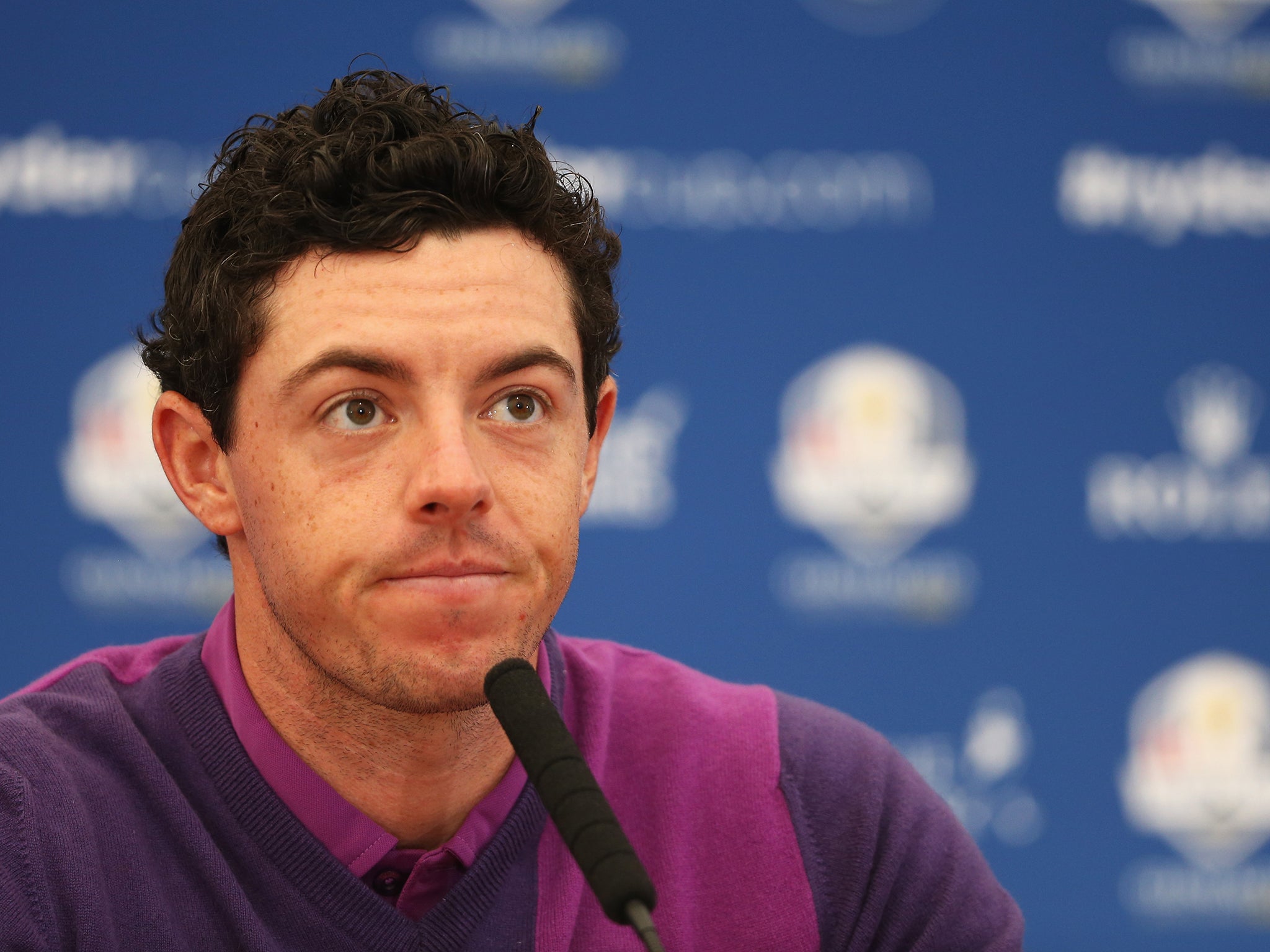 Rory McIlroy of Europe looks on at a press conference