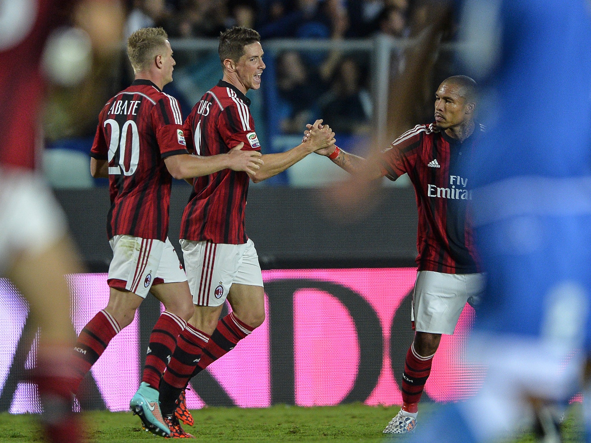 Fernando Torres celebrates his first goal for AC Milan