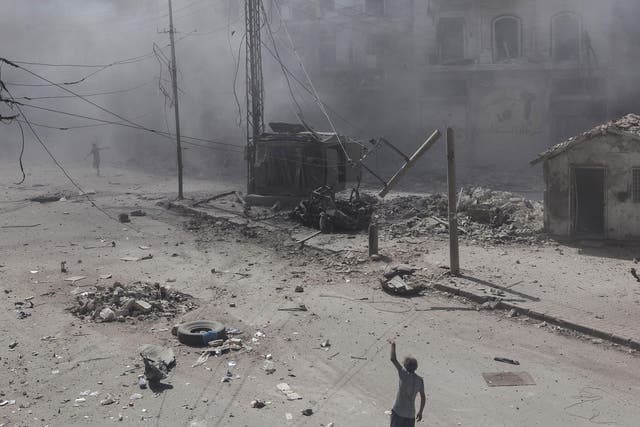 The aftermath of an airstrike on the Al Chaar neighbourhood in Aleppo in July. Air campaigns not supported by ground forces can damage the other side but may not win wars on their own