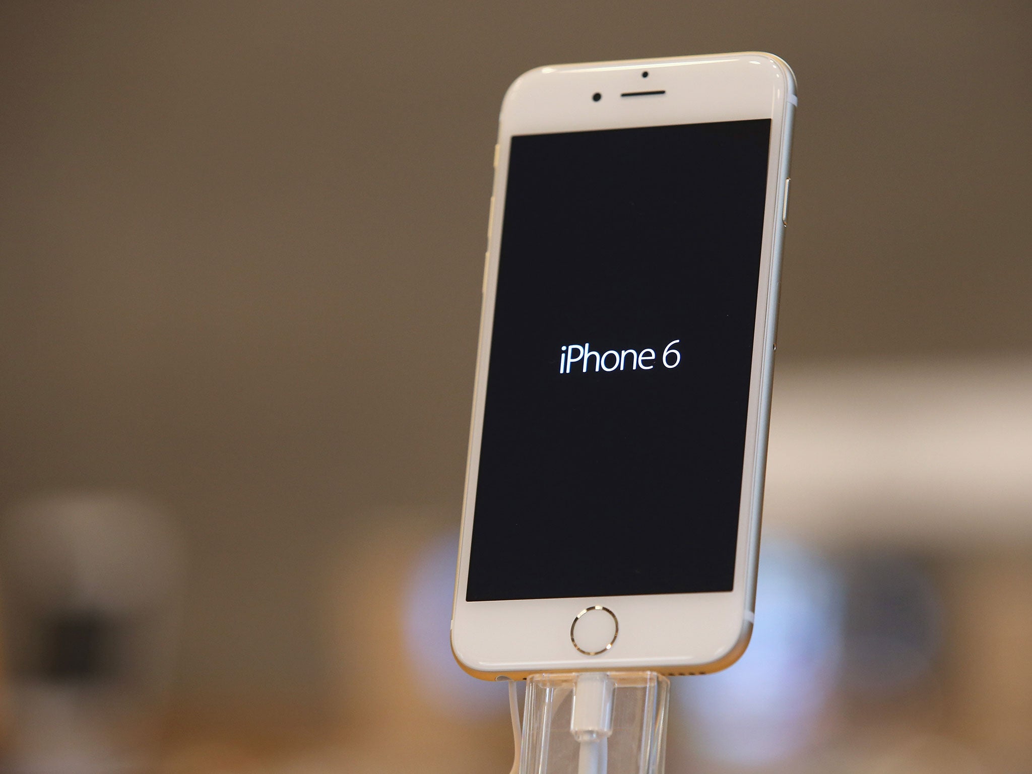 An Apple iPhone 6 stands on display at the Apple Store