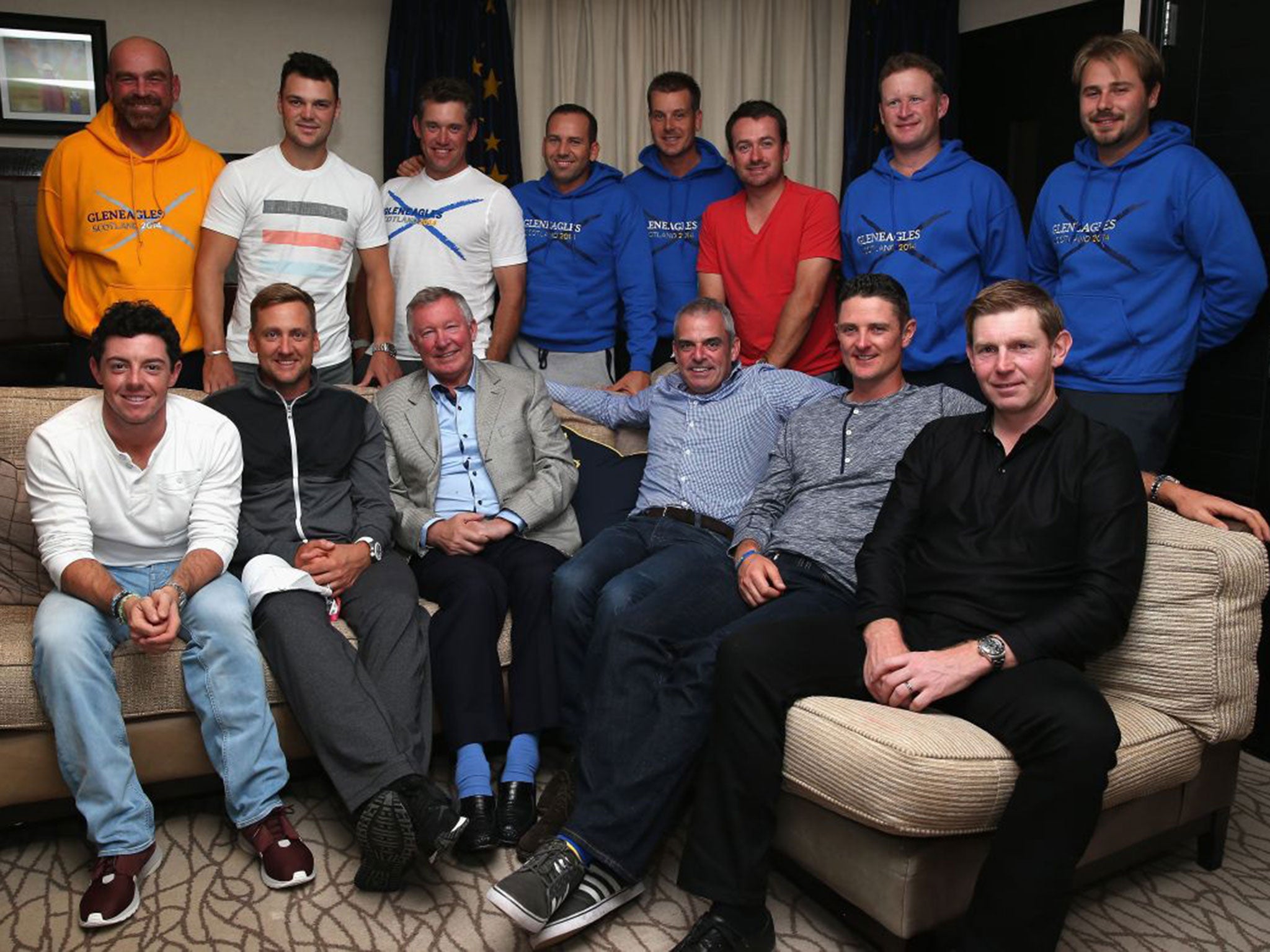 Sir Alex Ferguson with the European Ryder Cup team after his motivational pep talk: (left to right, front row): Rory McIlroy, Ian Poulter, Sir Alex Ferguson, Paul McGinley, Justin Rose, Stephen Gallacher and (back row) Thomas Bjorn, Martin Kaymer, Lee Wes