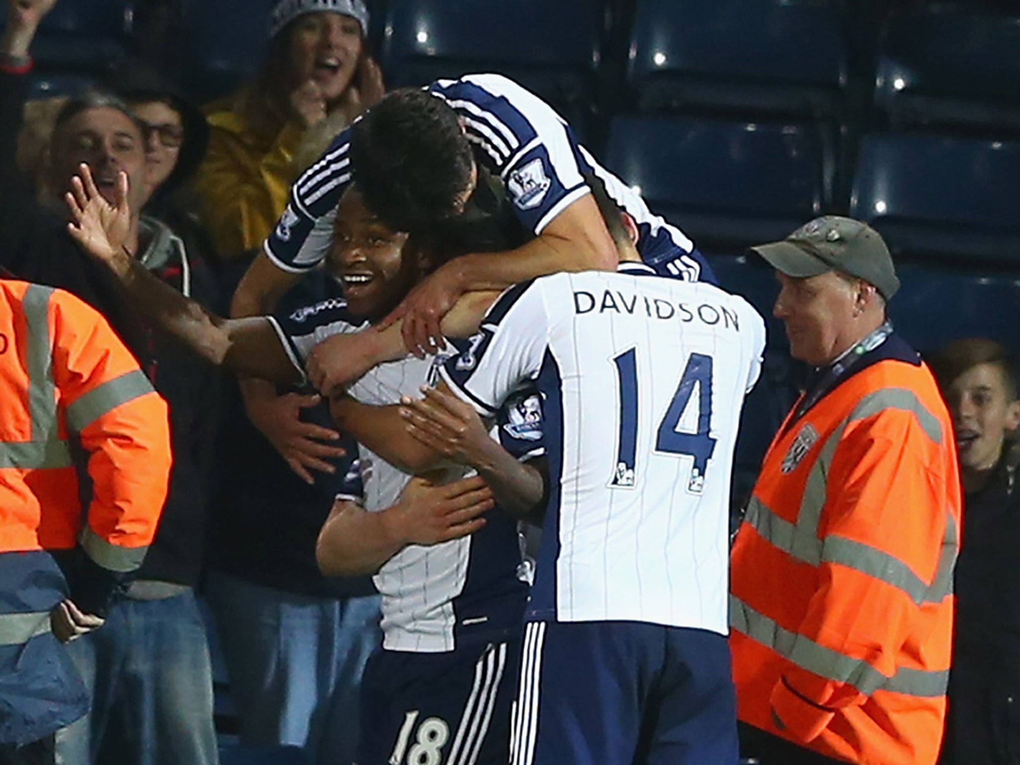 Saido Berahino is mobbed by his West Brom team-mates after scoring a winner against Hull City in the Capital One Cup in midweek