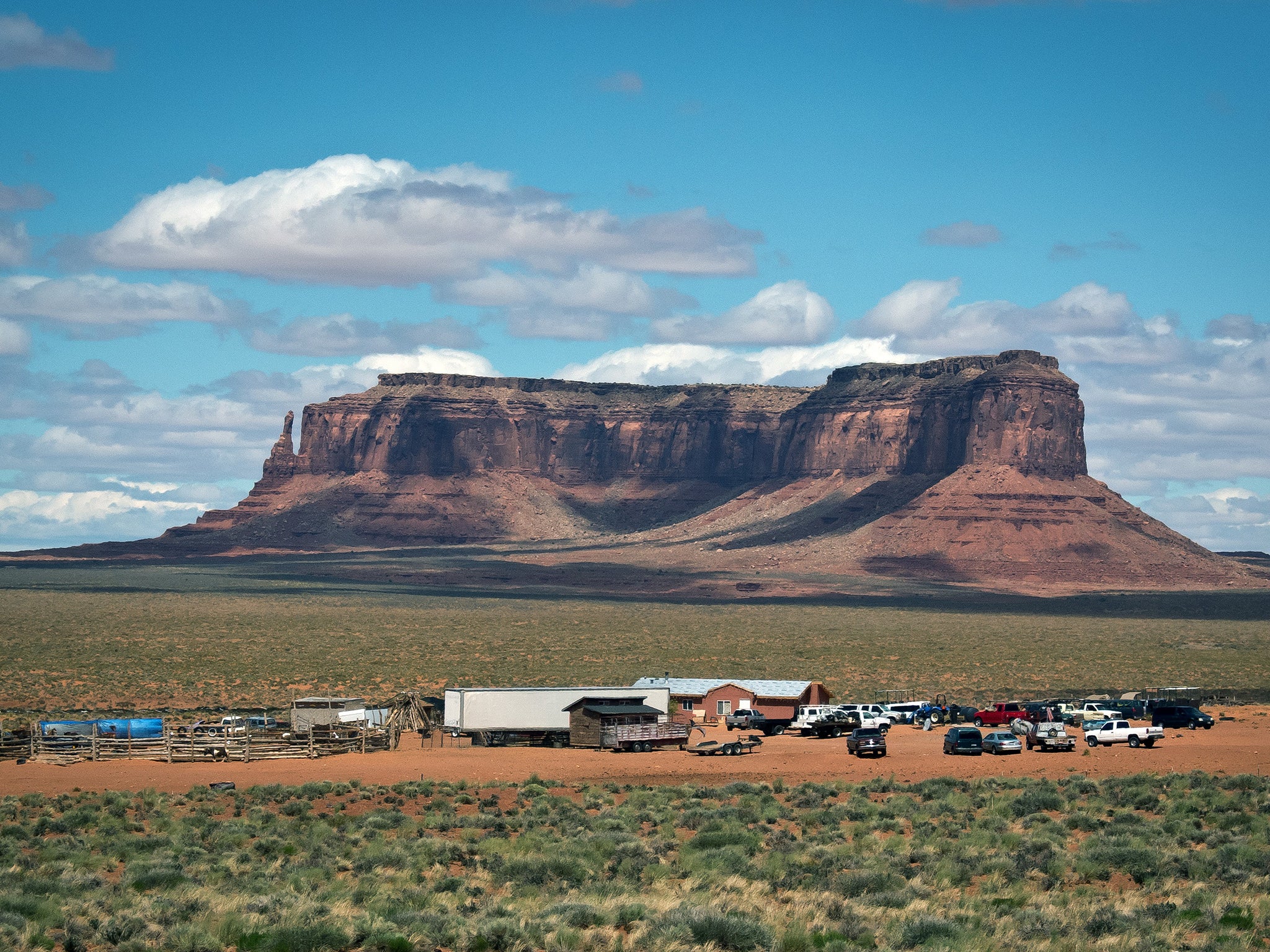 A Navajo farm is seen next to a rock formation in Monument Valley Navajo Tribal park, Utah