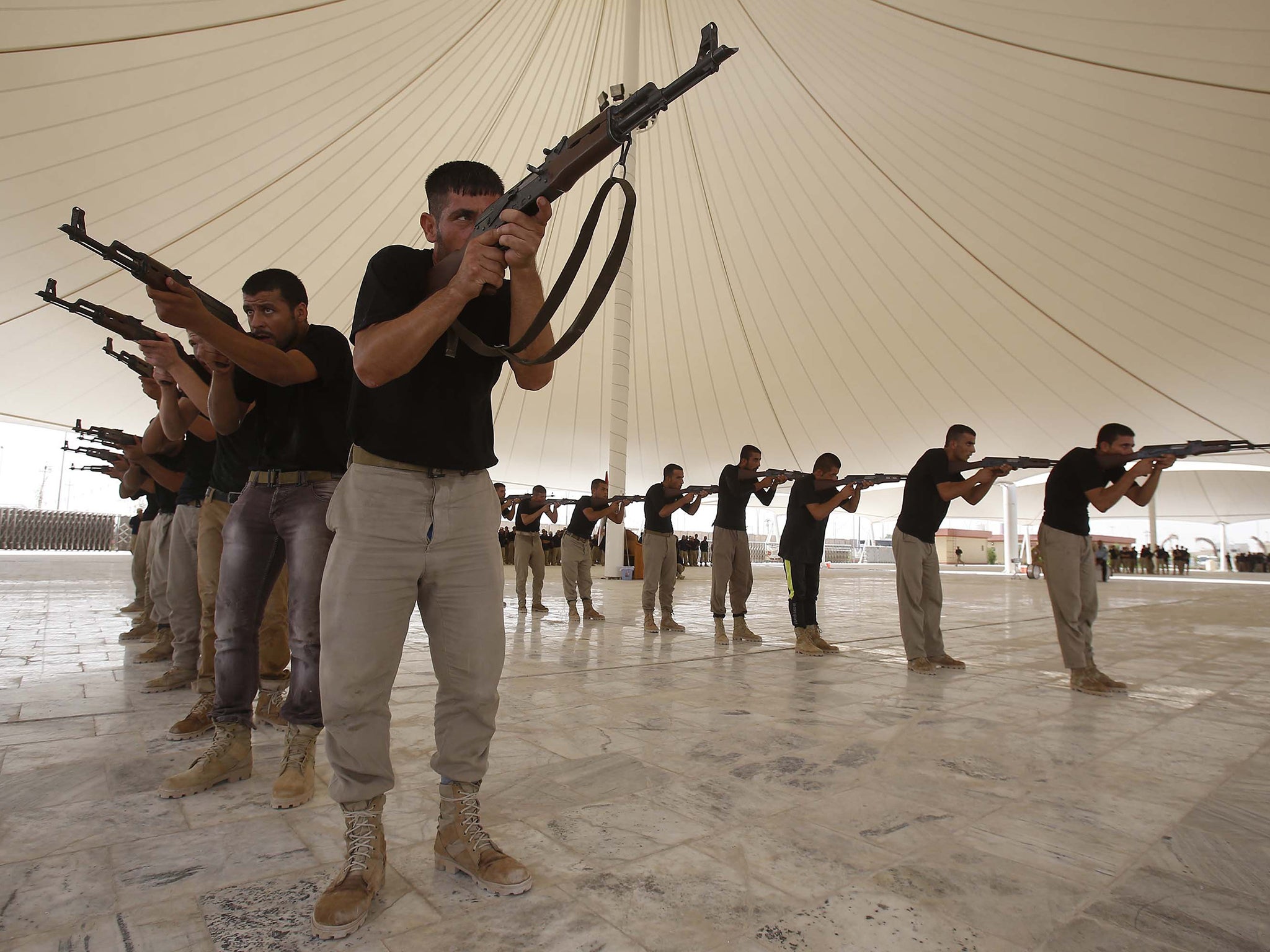 Shia volunteers train for the fight against Isis in central Iraq