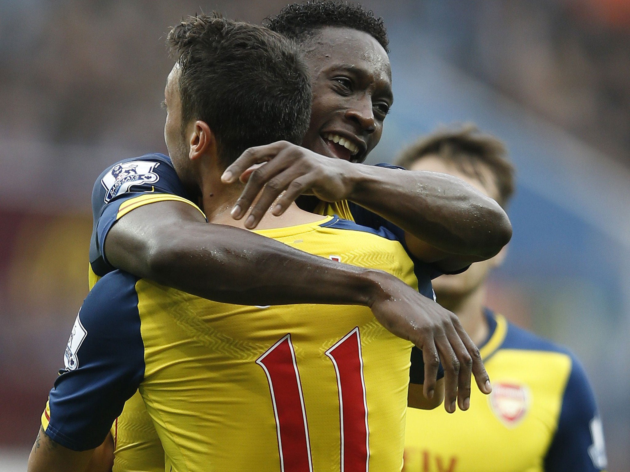 Mesut Ozil and Danny Welbeck celebrate during Arsenal's 3-0 win over Aston Villa