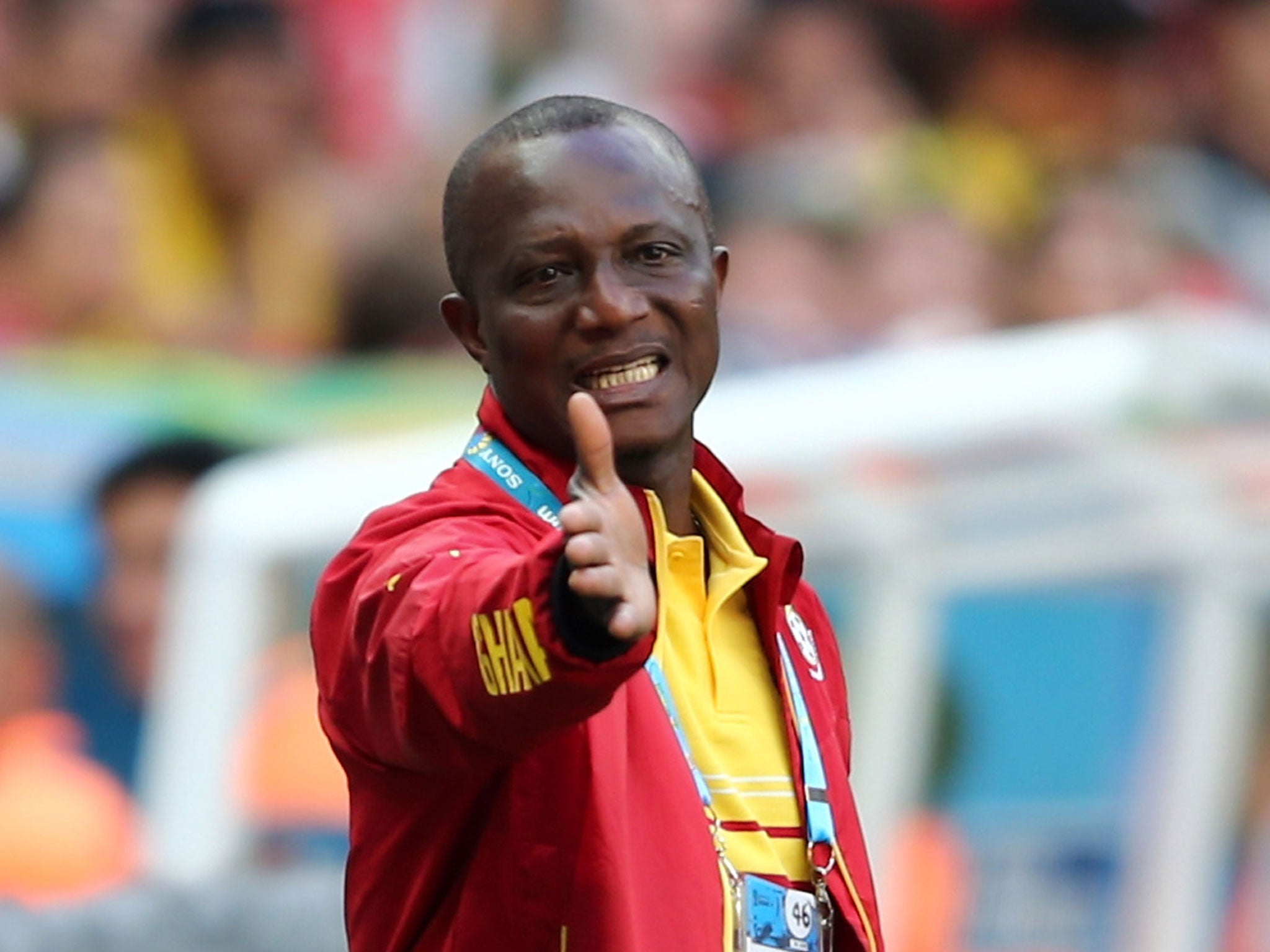 Kwesi Appiah makes a gesture from the touchline in the match against Portugal