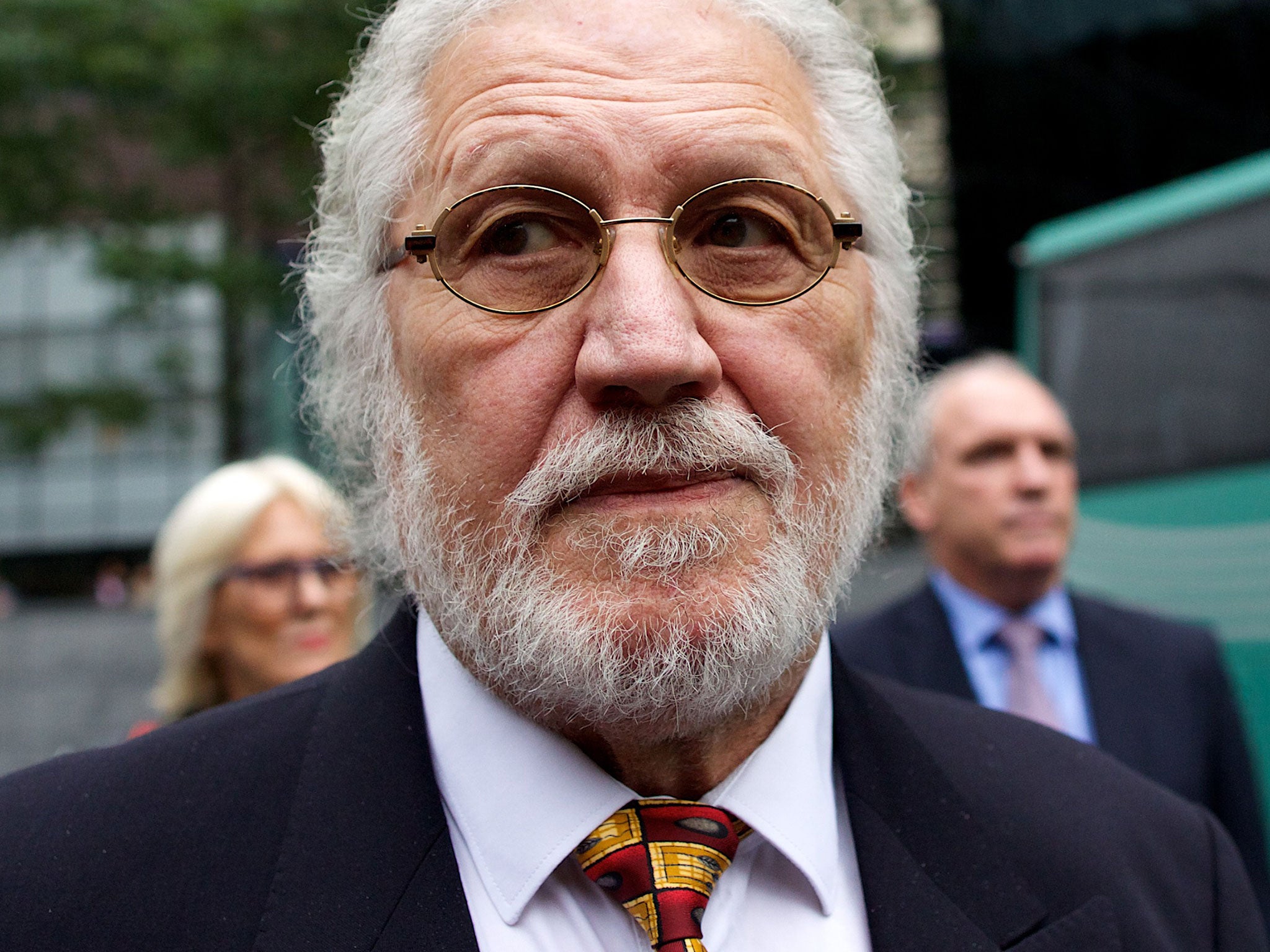 Former radio and TV presenter Dave Lee Travis arrives at Southwark Crown Court for sentencing in central London on September 26, 2014. Veteran British DJ Dave Lee Travis was found guilty Tuesday of groping a female television personality in 1995, followin