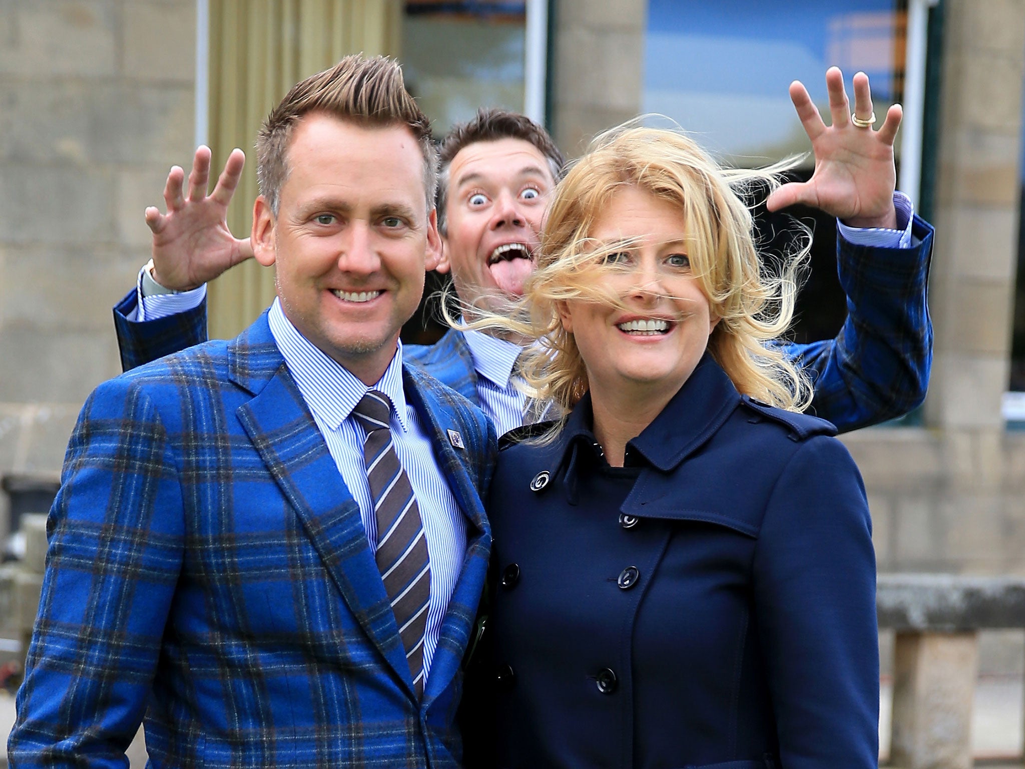 Ian Poulter of Europe and wife Katie Poulter pose as team-mate Lee Westwood photo bombs before the opening ceremony at Gleneagles