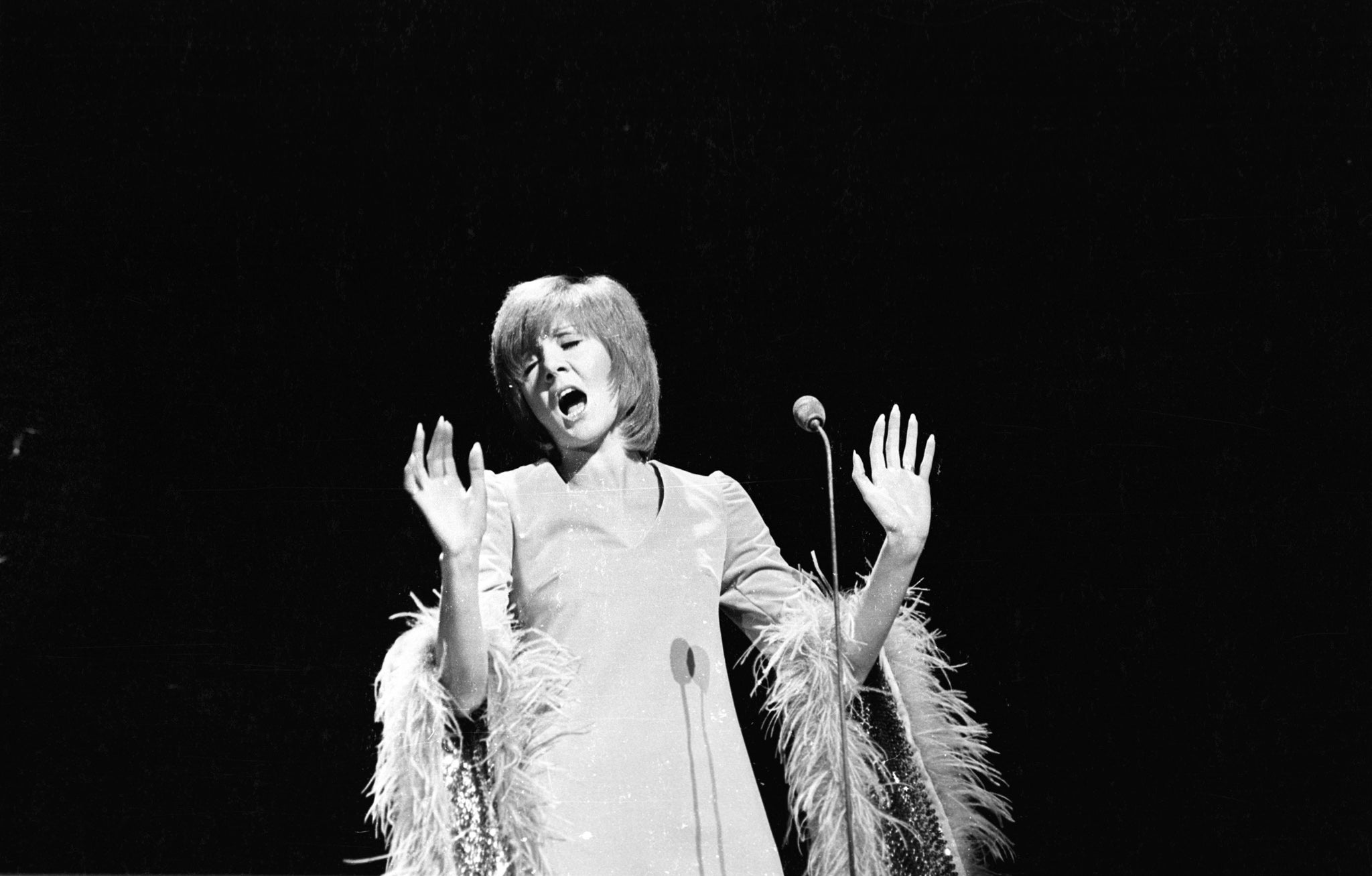 Cilla Black performs on stage in 1969