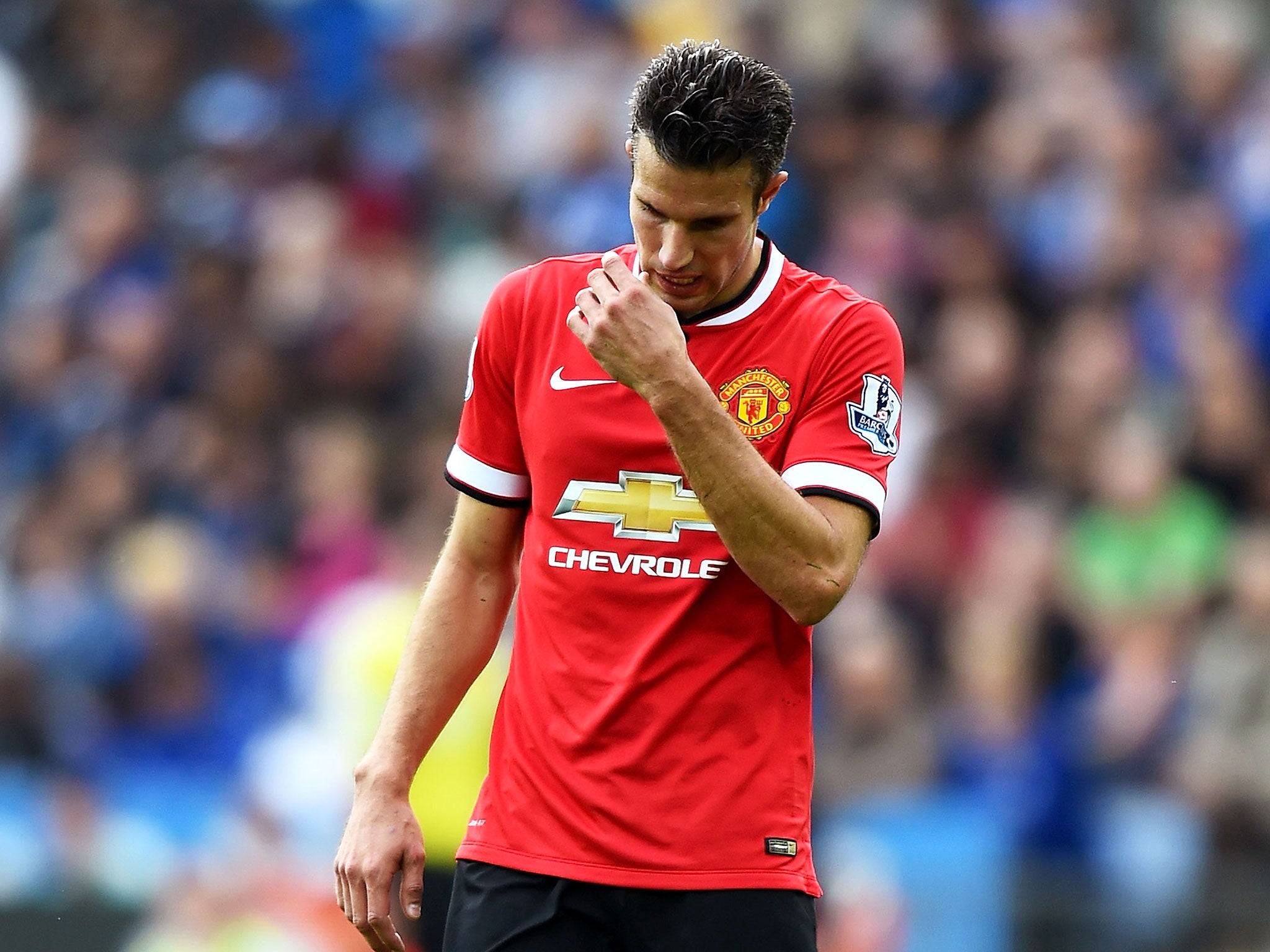 Robin van Persie leaves the field at the King Power Stadium last Sunday