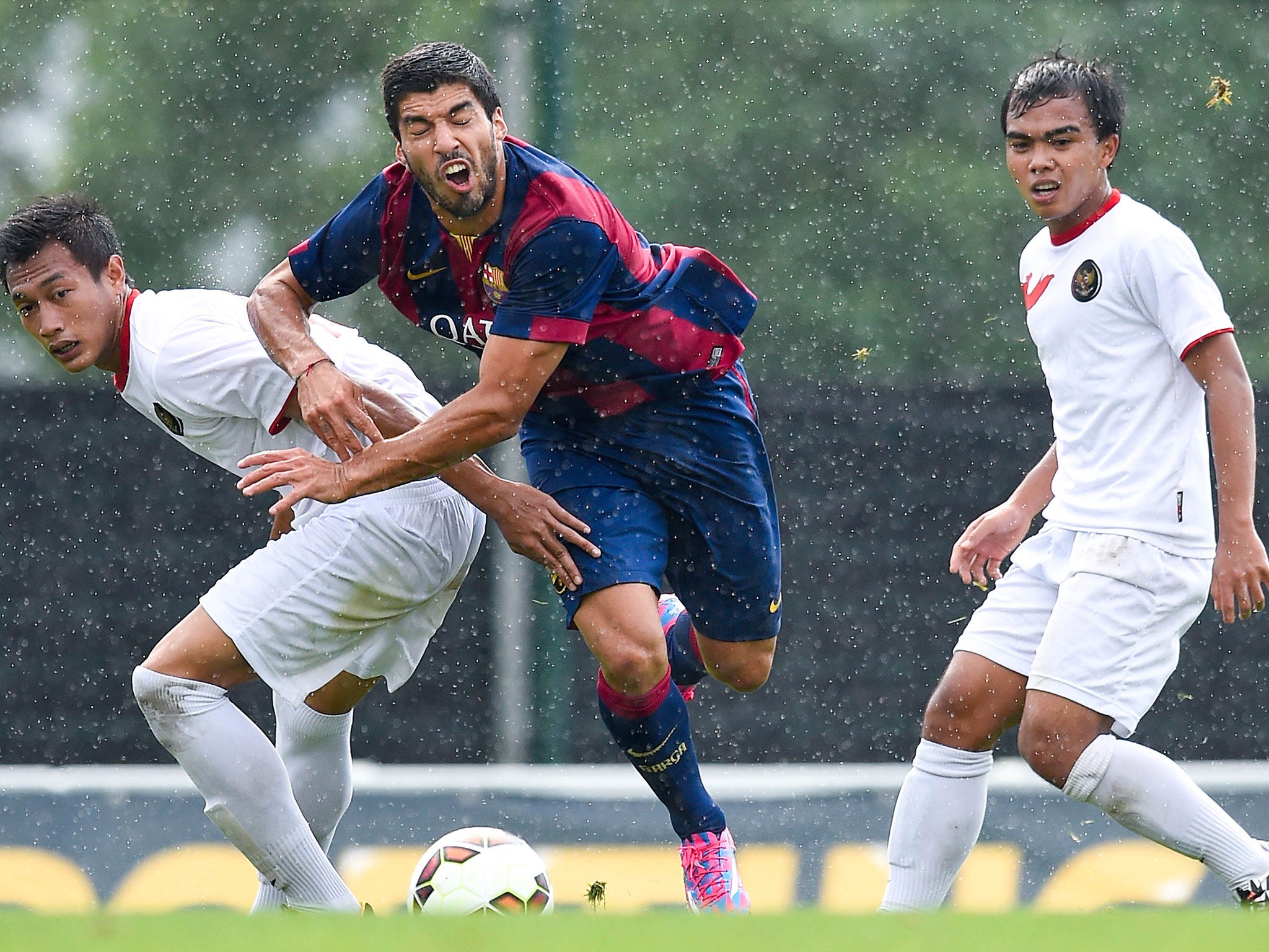 Suarez competes for the ball against an Indonesia U-19 side