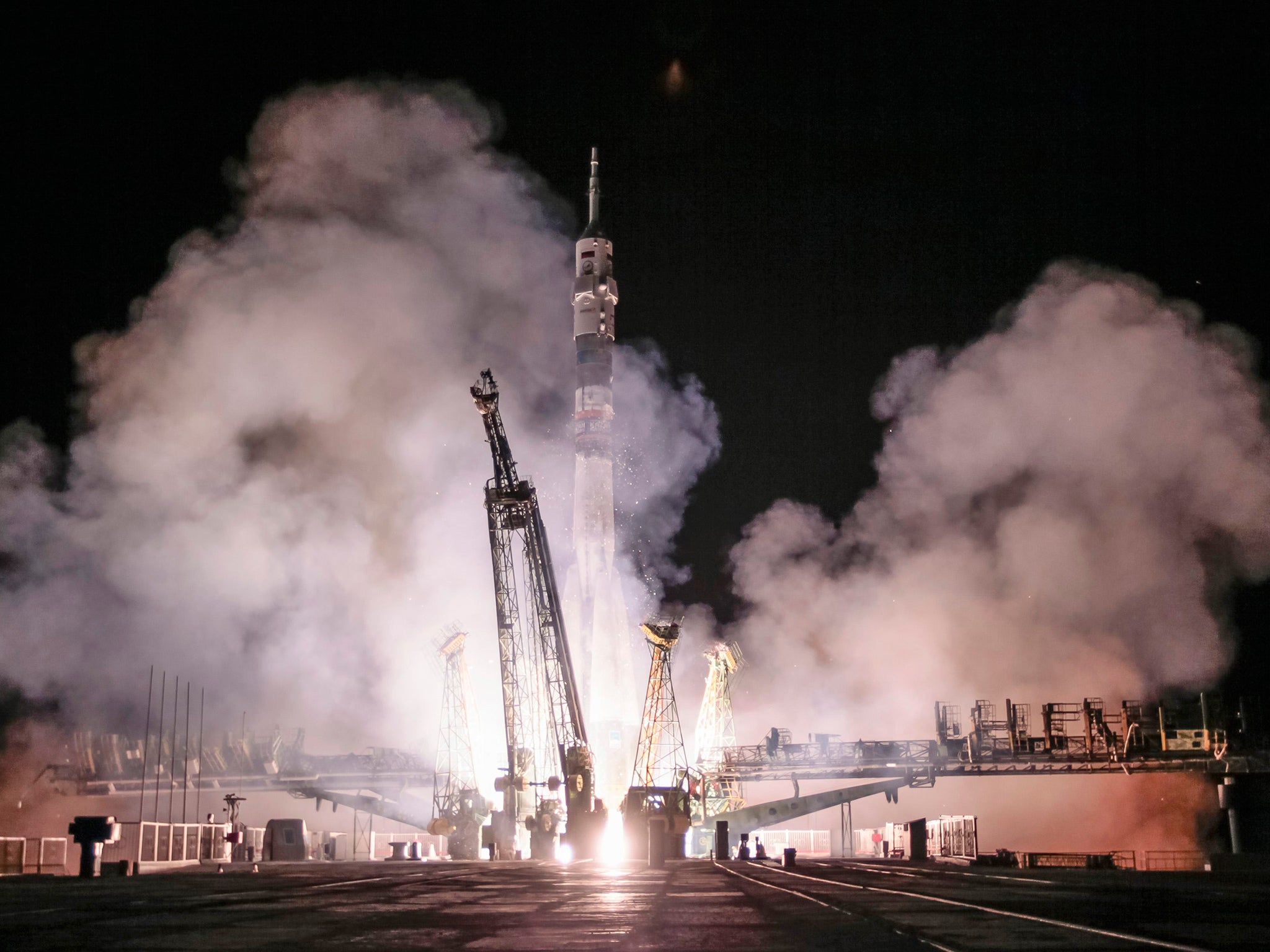 The Soyuz TMA-14M spacecraft carrying the International Space Station crew of Barry Wilmore of the U.S., and Alexander Samokutyaev and Elena Serova of Russia blasts off from the launch pad at the Baikonur cosmodrome