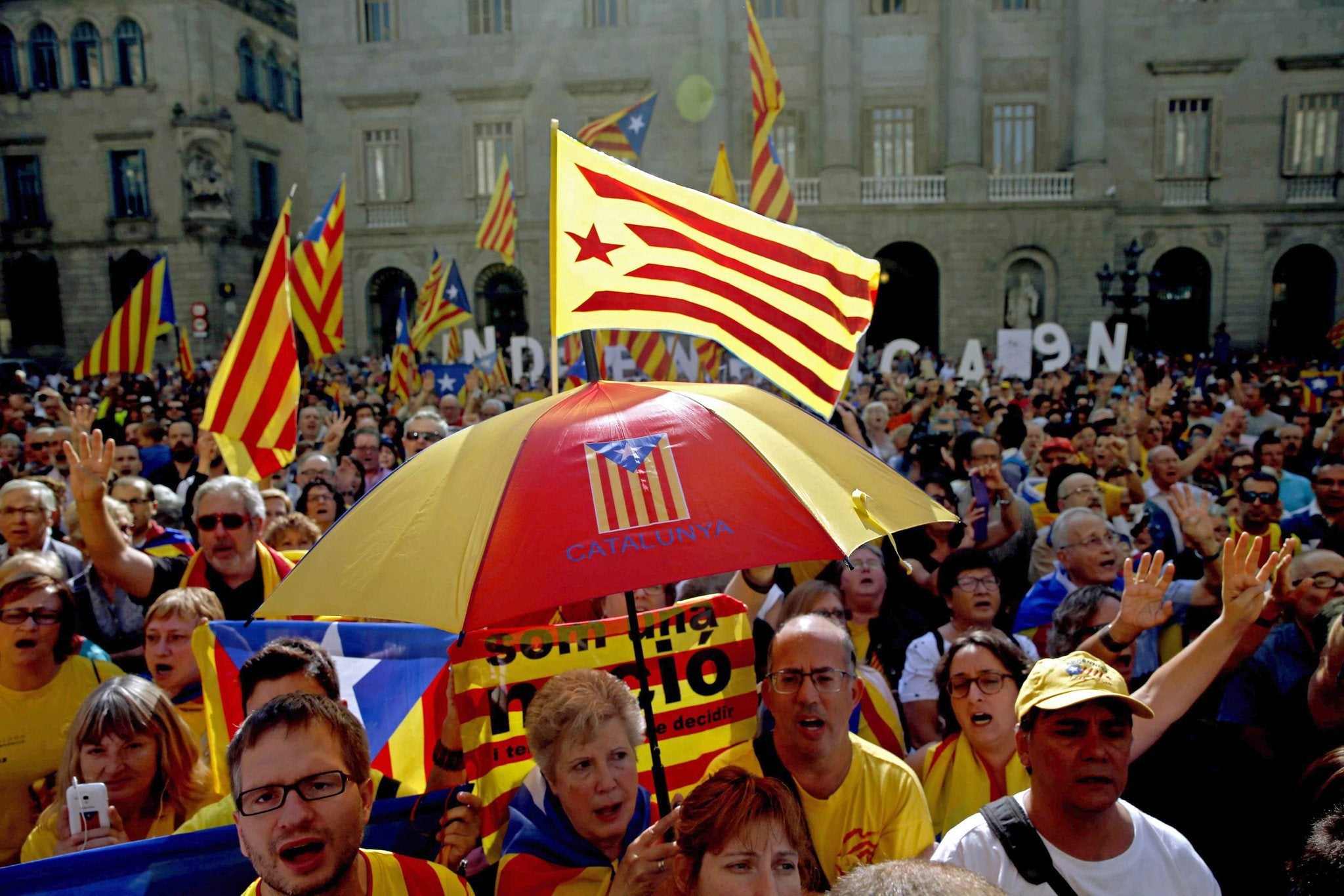 People gather in support of the referendum for independence at Sant Jaume Square in Barcelona on 27 September 2014