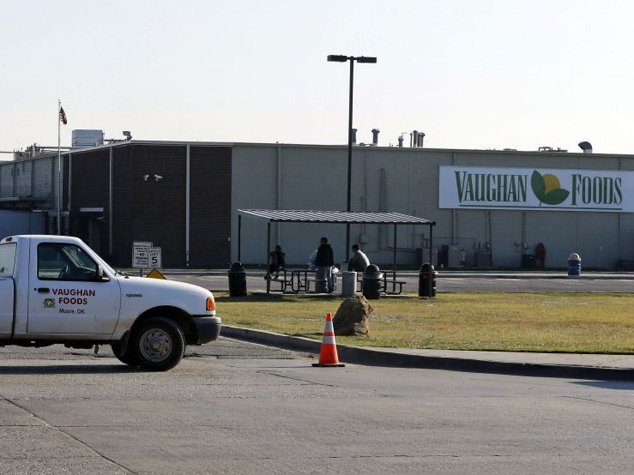 A truck sits near the entrance to Vaughn Food in Moore, Okla., Friday, Sept. 26, 2014,