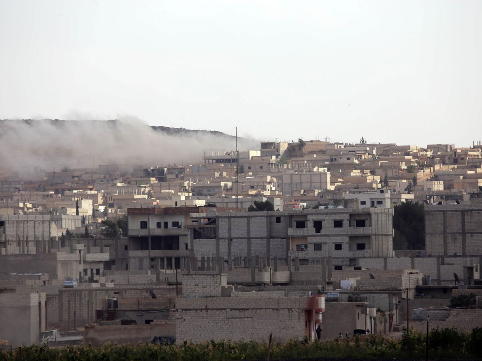 Smoke sweeps through the Kurdish town of Kobani