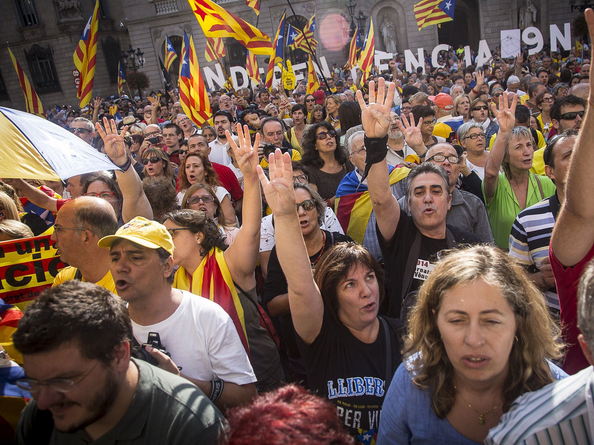 Pro-independence Catalans at a rally on Sant Jaume square in Barcelona last month