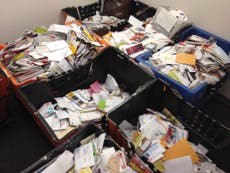 Alcoholic New York postman hoarded a tonne of undelivered mail at his